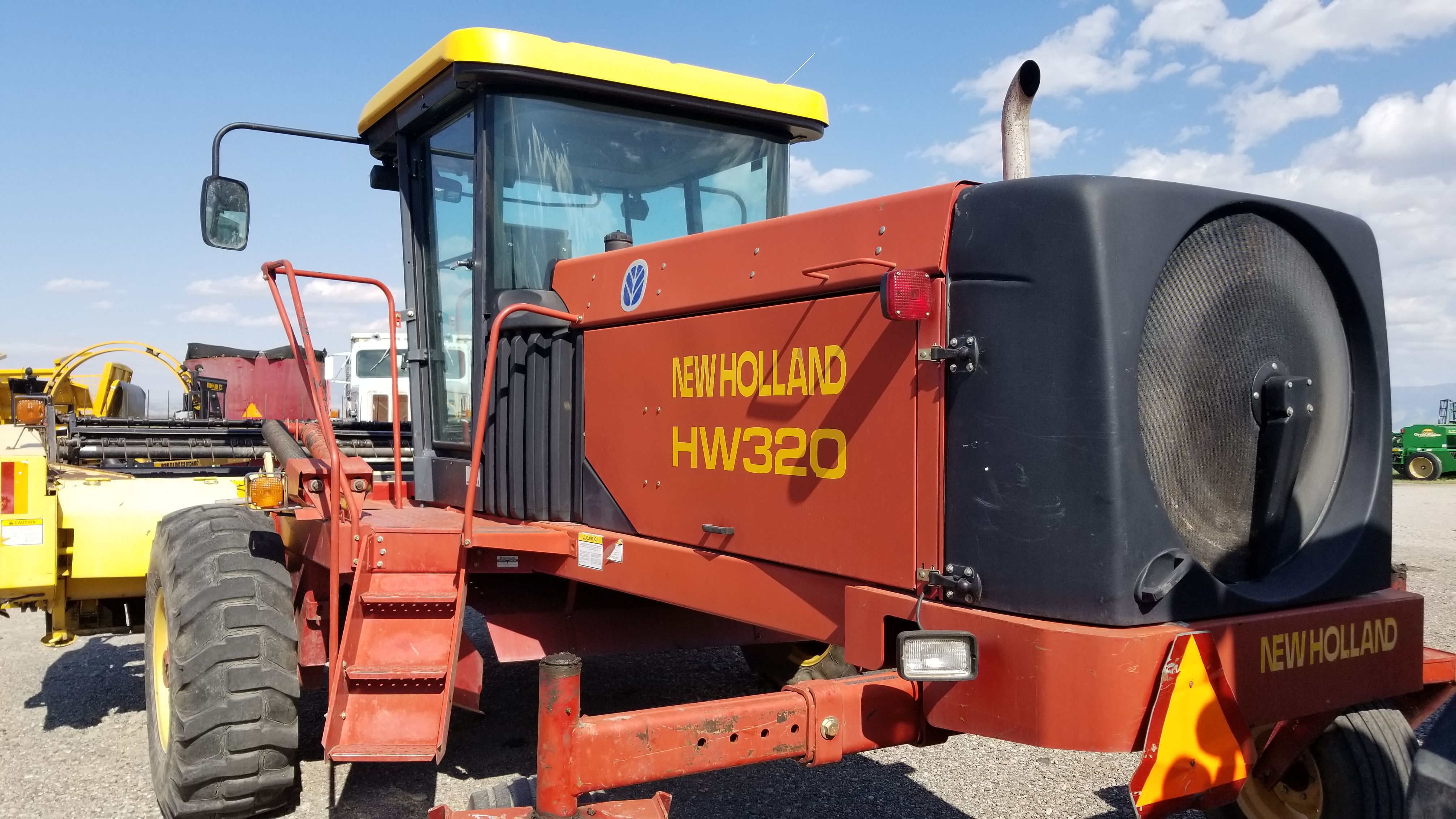 2001 New Holland HW320 Windrower