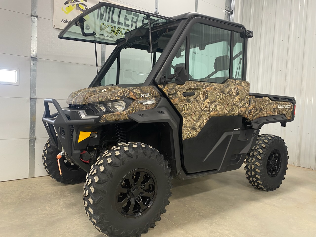 2023 Can-Am 2023 DEFENDER LTD CAB HD10 CAMO SKU # 8JPF Utility Vehicle