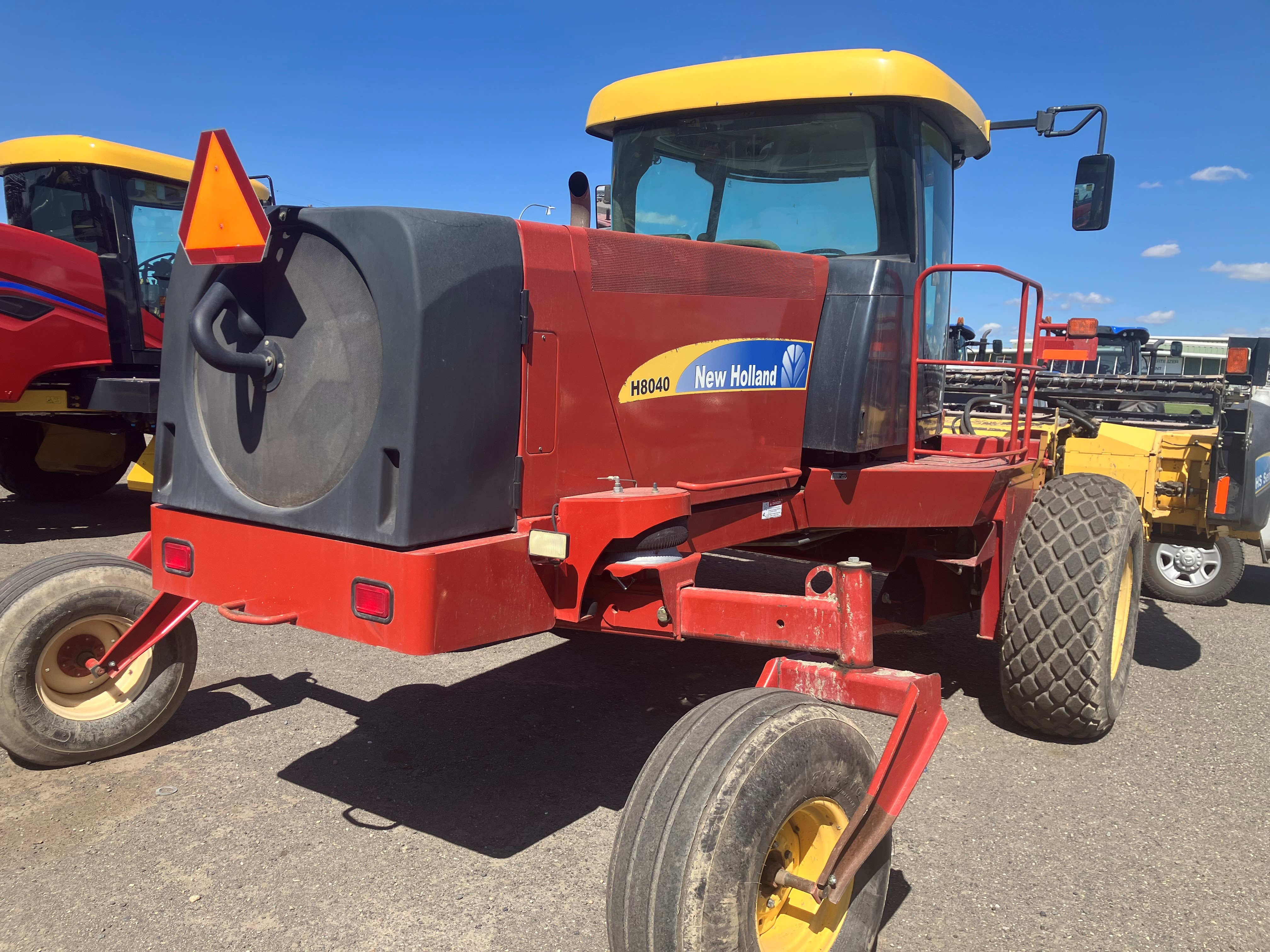 2011 New Holland H8040 Windrower