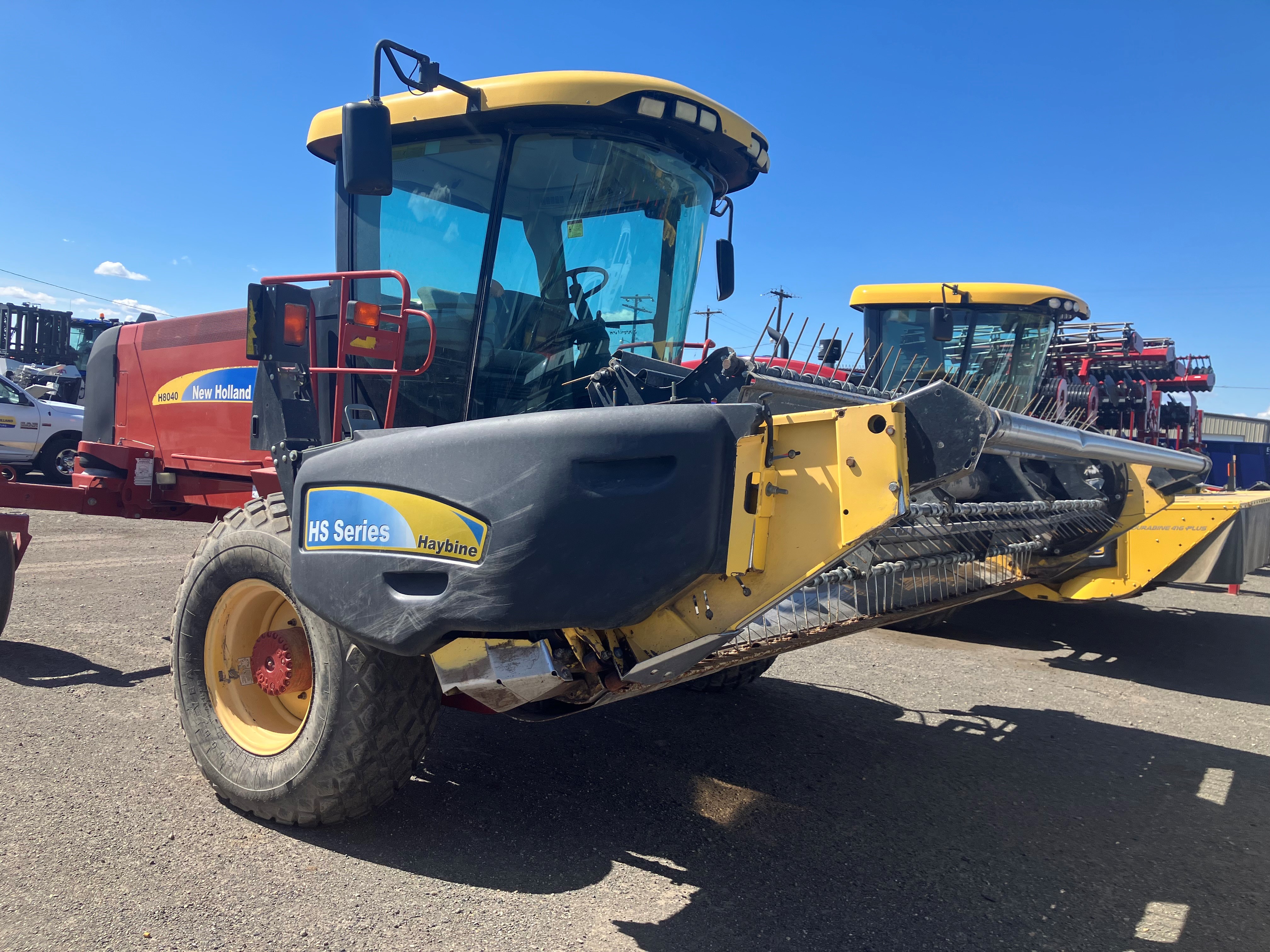 2011 New Holland H8040 Windrower