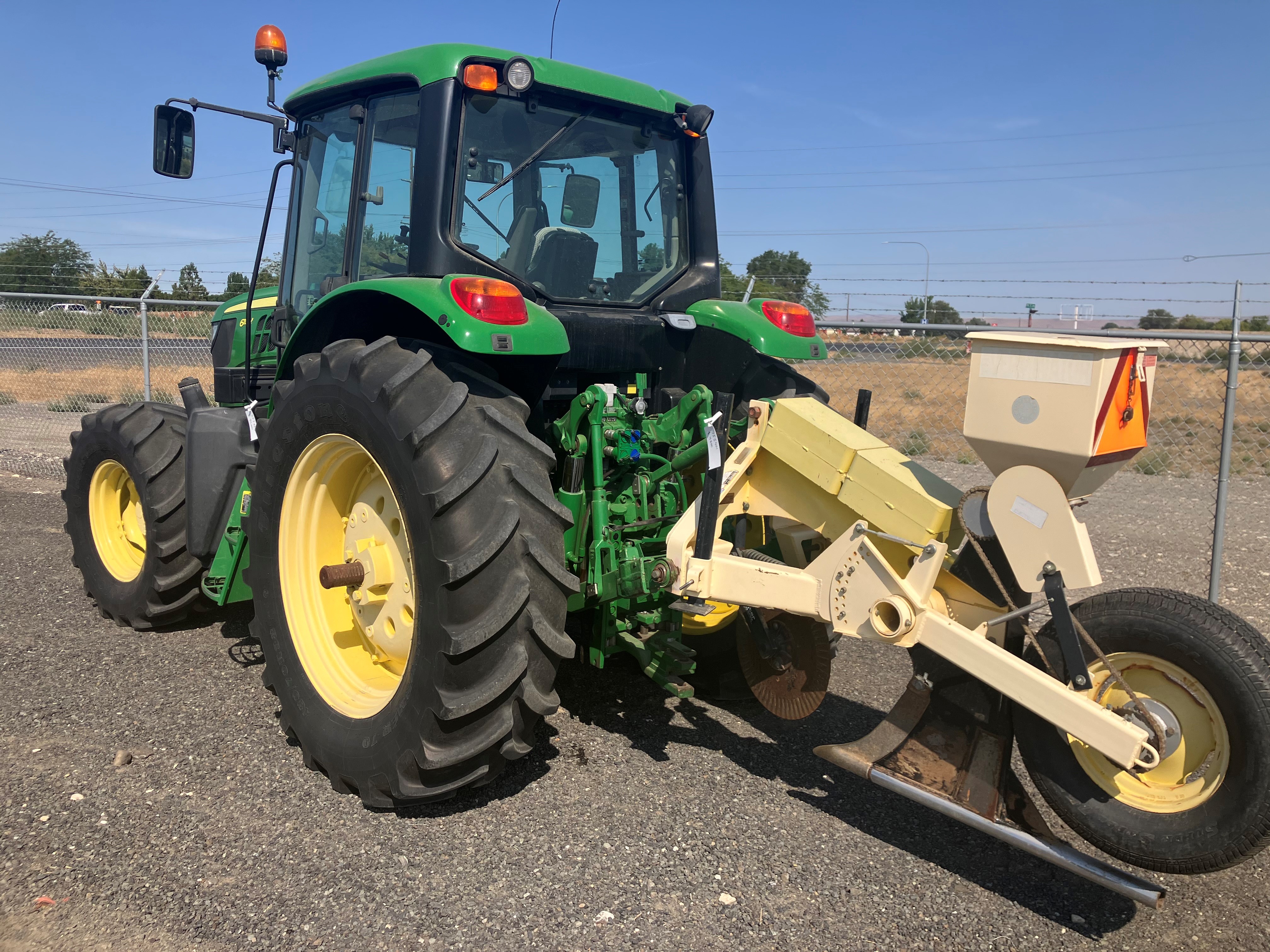 2014 John Deere 6115M Tractor