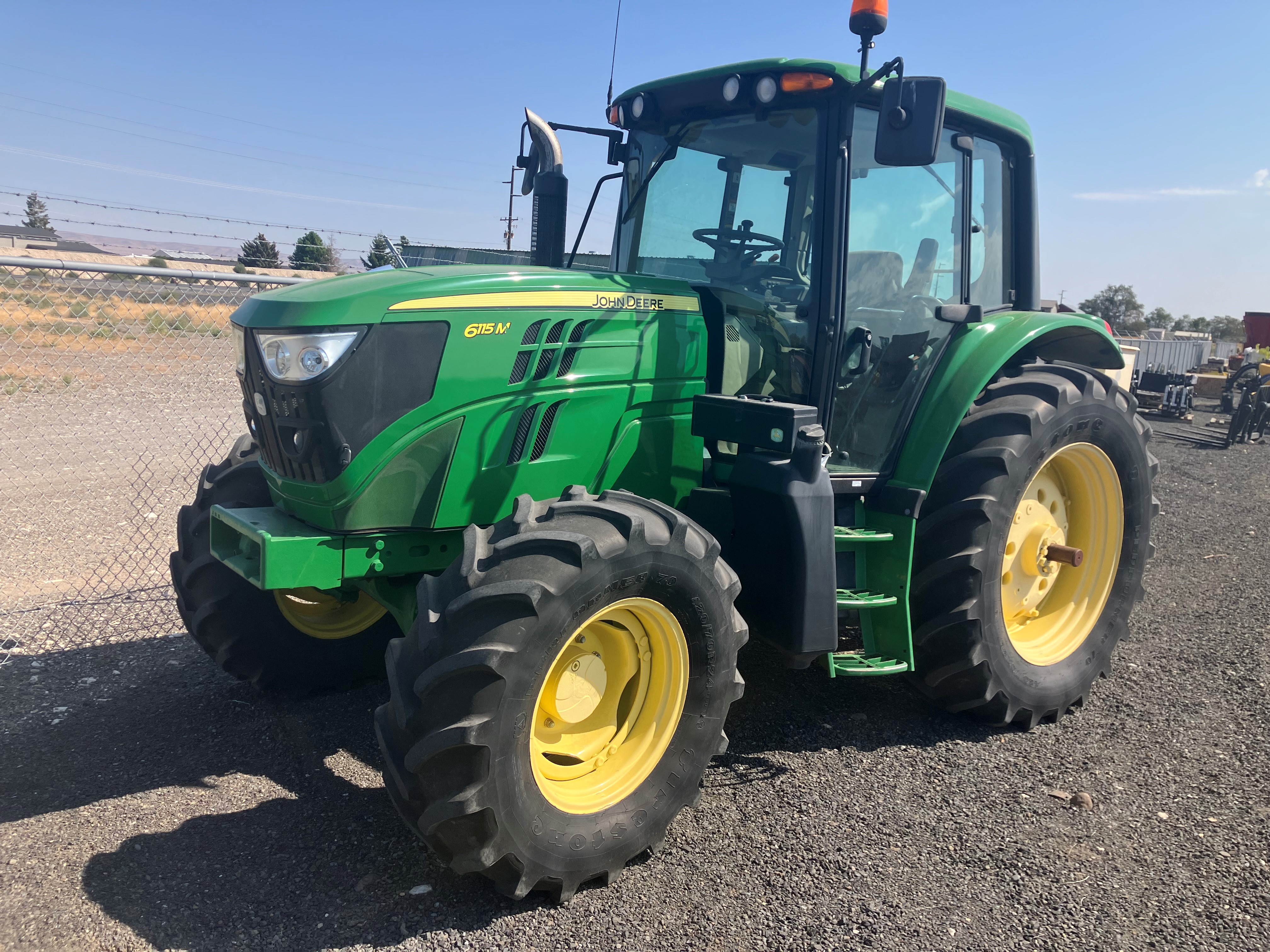 2014 John Deere 6115M Tractor