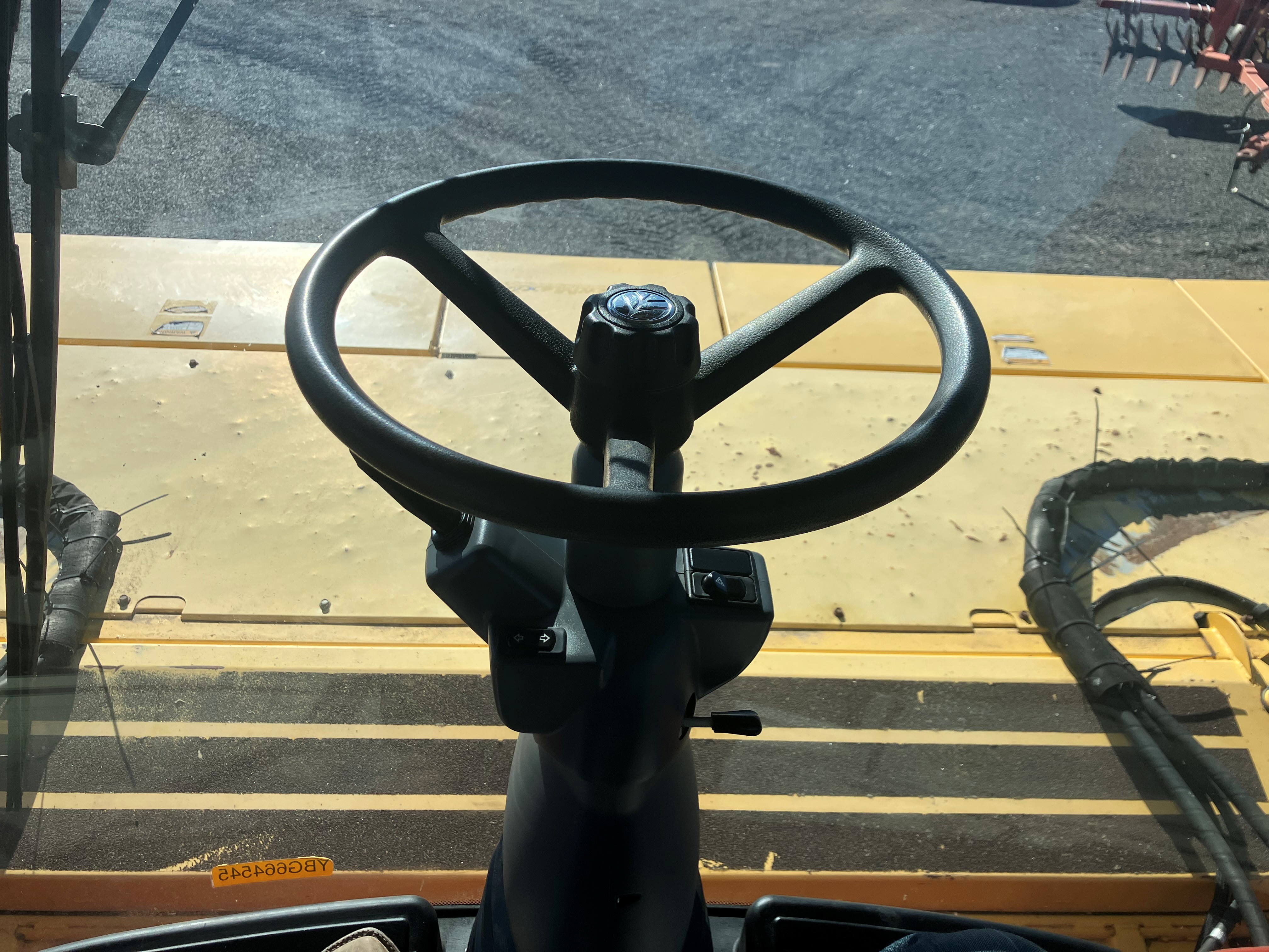 2011 New Holland H8080 Windrower