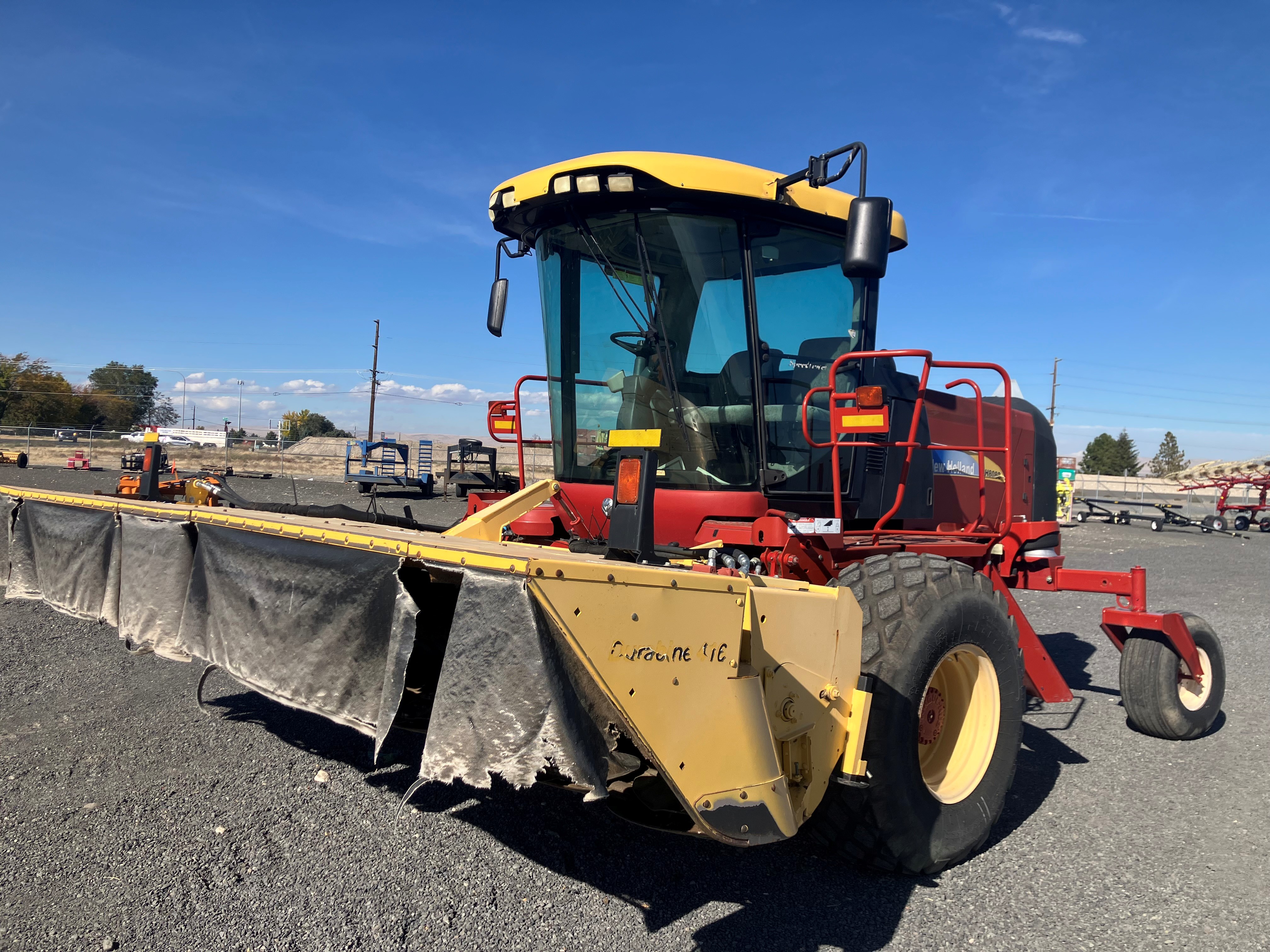2011 New Holland H8080 Windrower