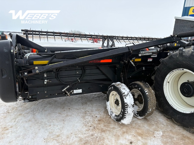 2010 MacDon M150 Windrower