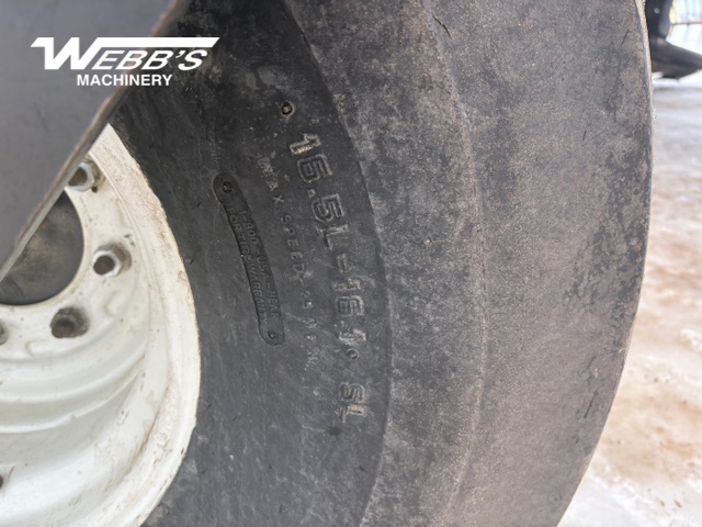 2010 MacDon M150 Windrower