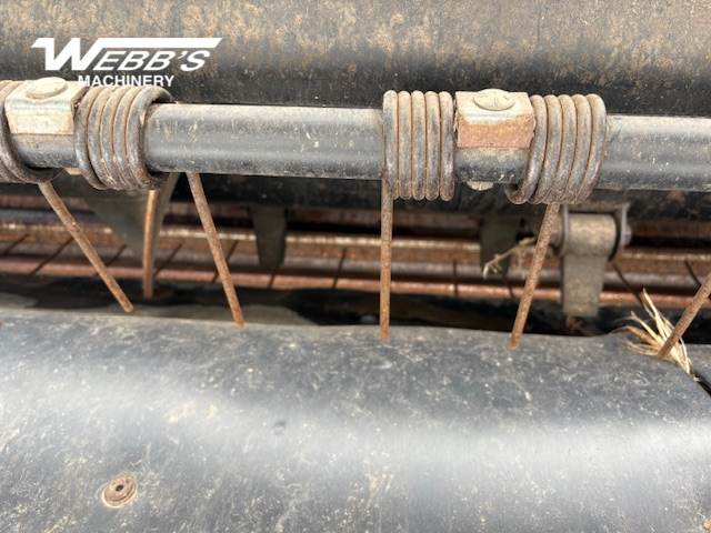 2010 MacDon M150 Windrower