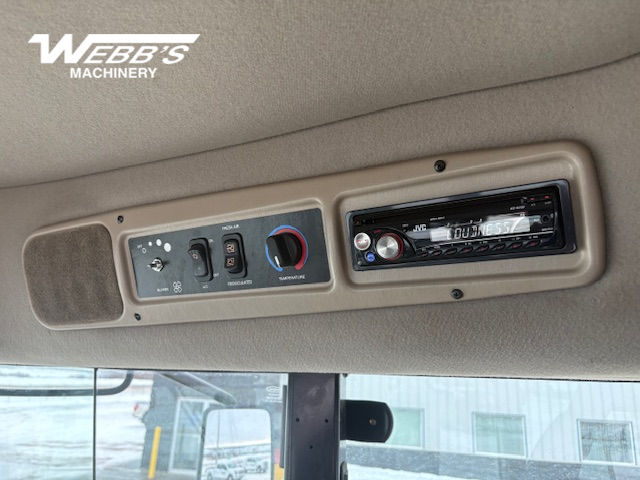 2010 MacDon M150 Windrower