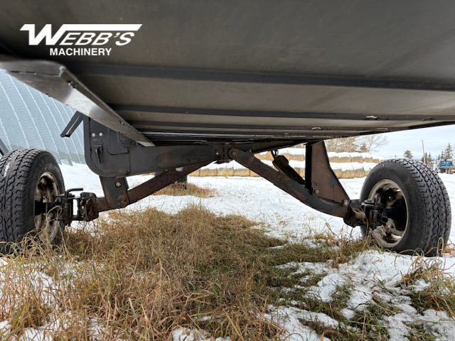 2010 MacDon M150 Windrower