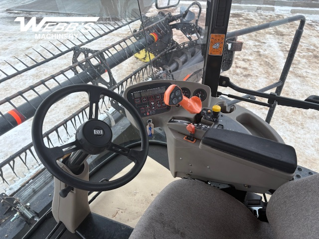 2010 MacDon M150 Windrower