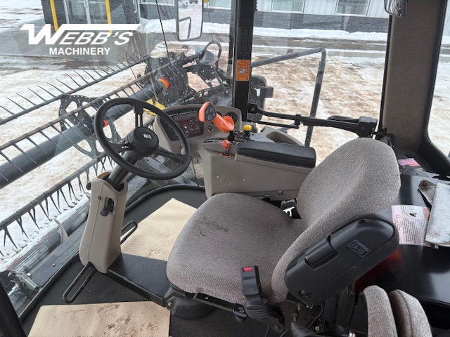 2010 MacDon M150 Windrower