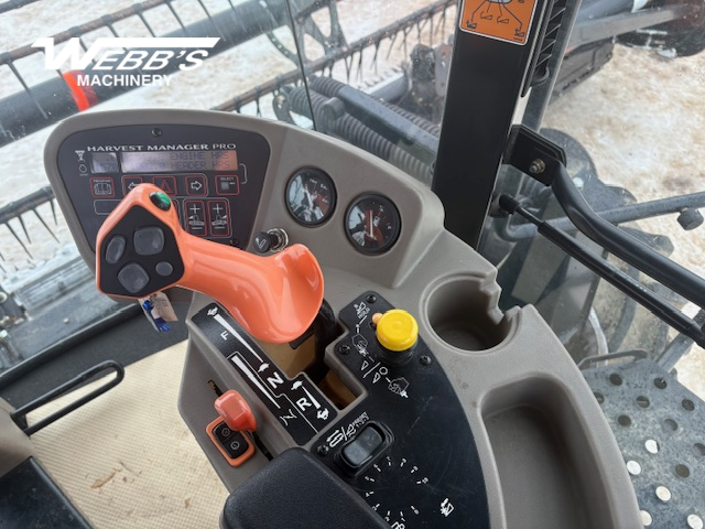 2010 MacDon M150 Windrower