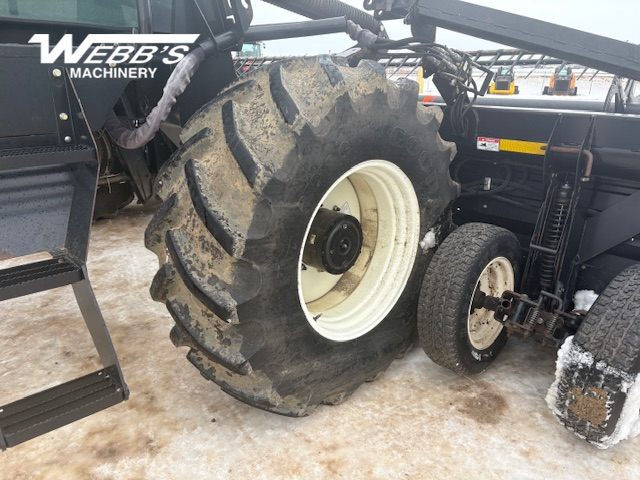 2010 MacDon M150 Windrower