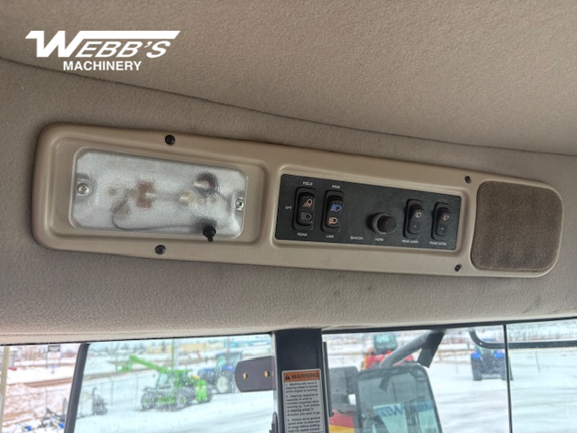 2010 MacDon M150 Windrower