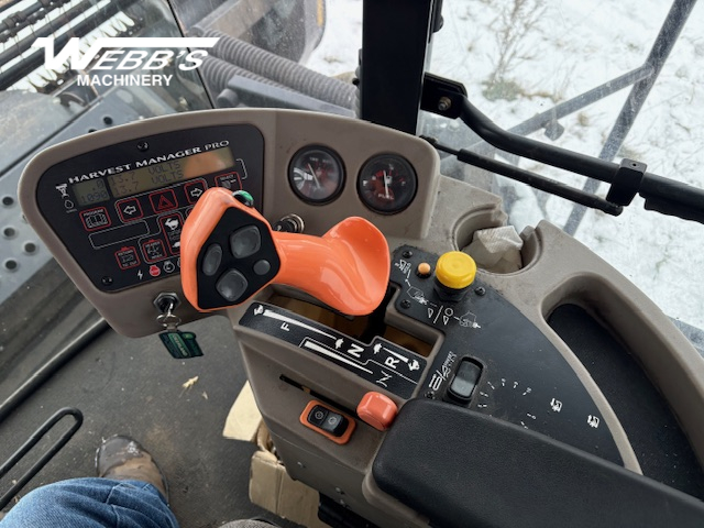 2010 MacDon M150 Windrower