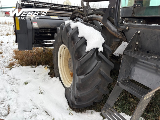 2010 MacDon M150 Windrower