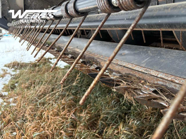 2010 MacDon M150 Windrower