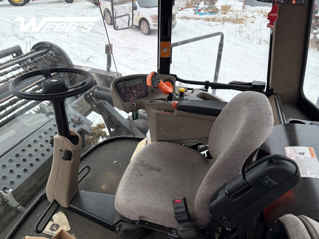 2010 MacDon M150 Windrower