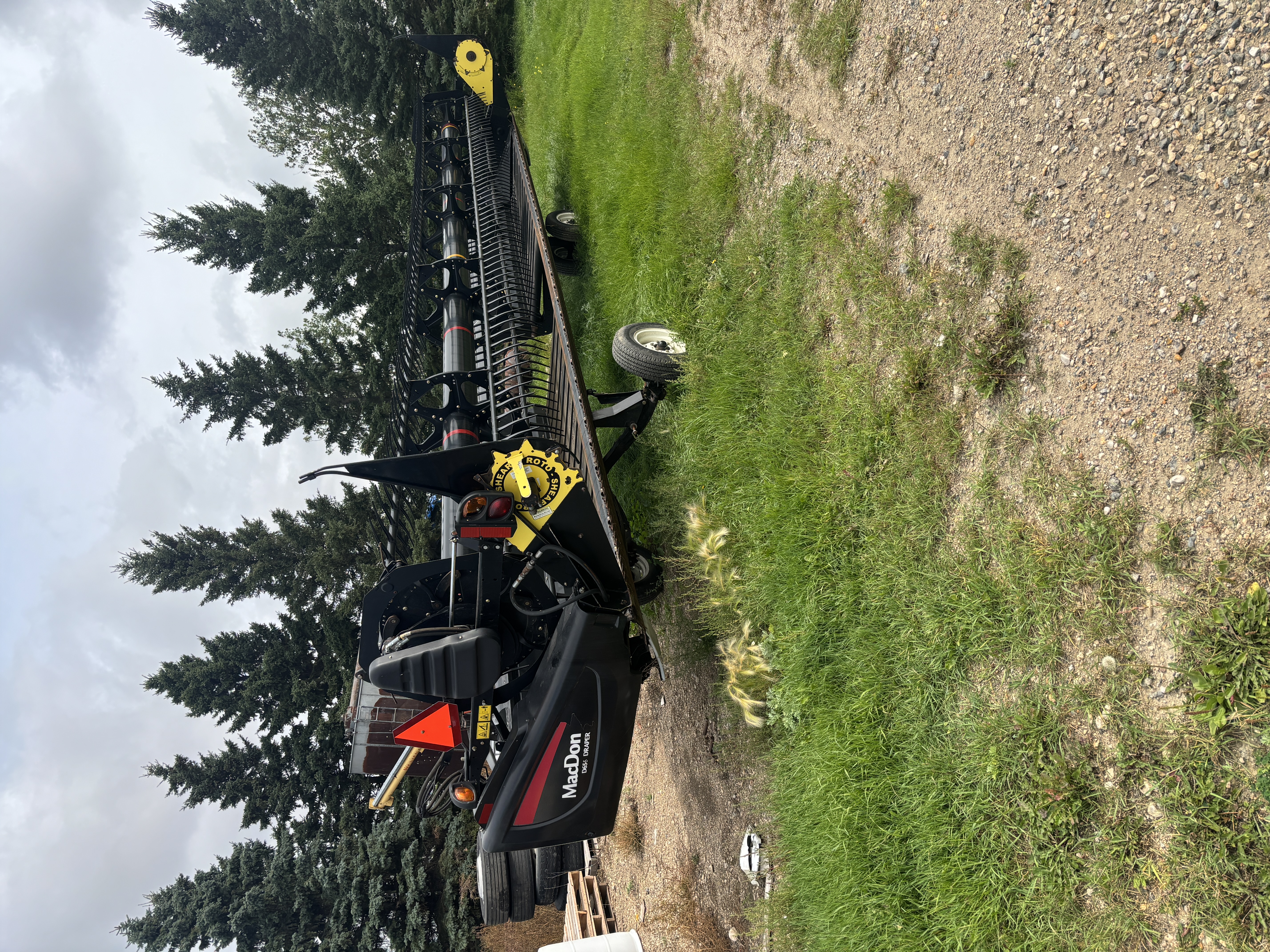 2016 MacDon M155E4 Windrower