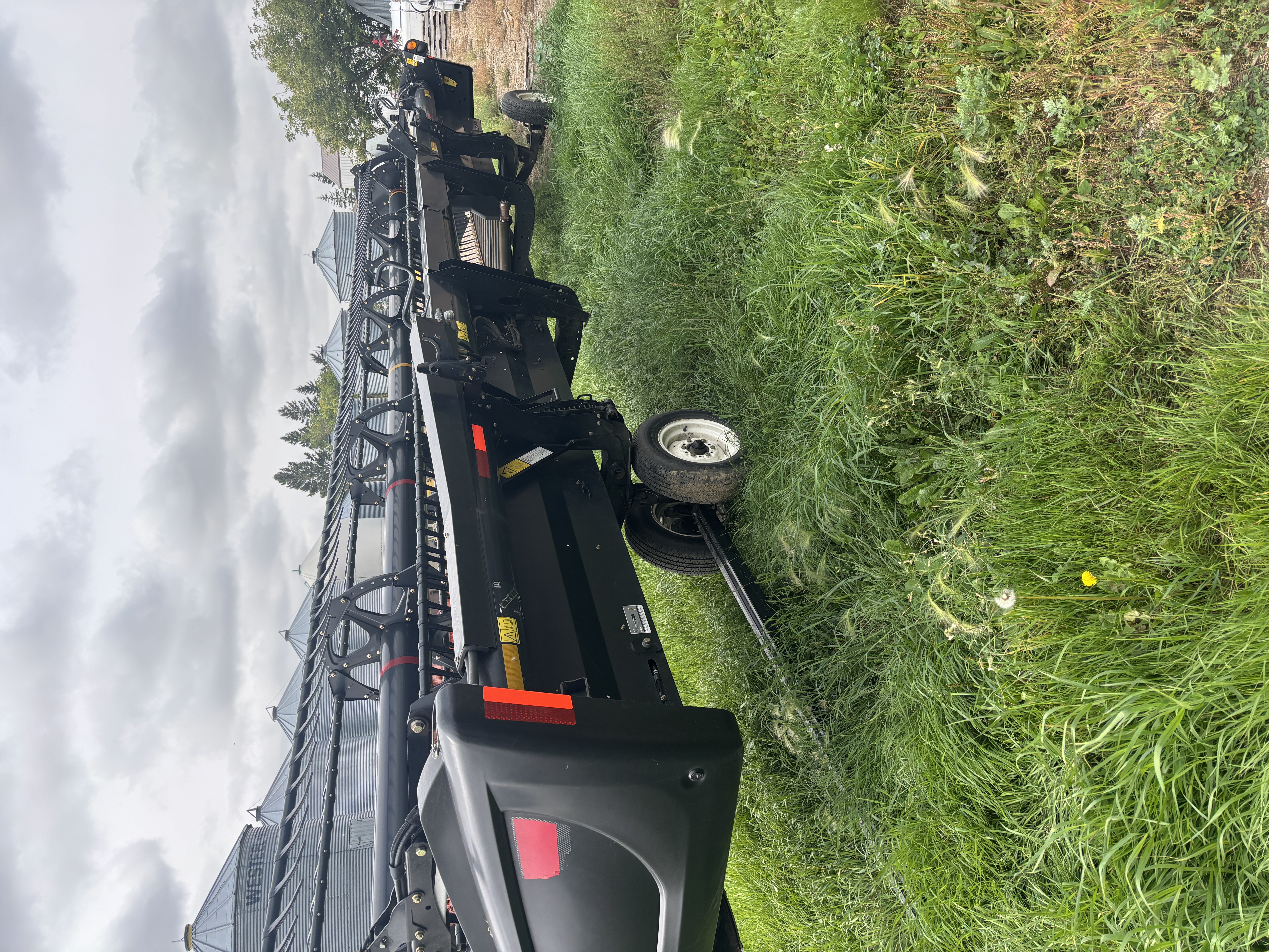 2016 MacDon M155E4 Windrower