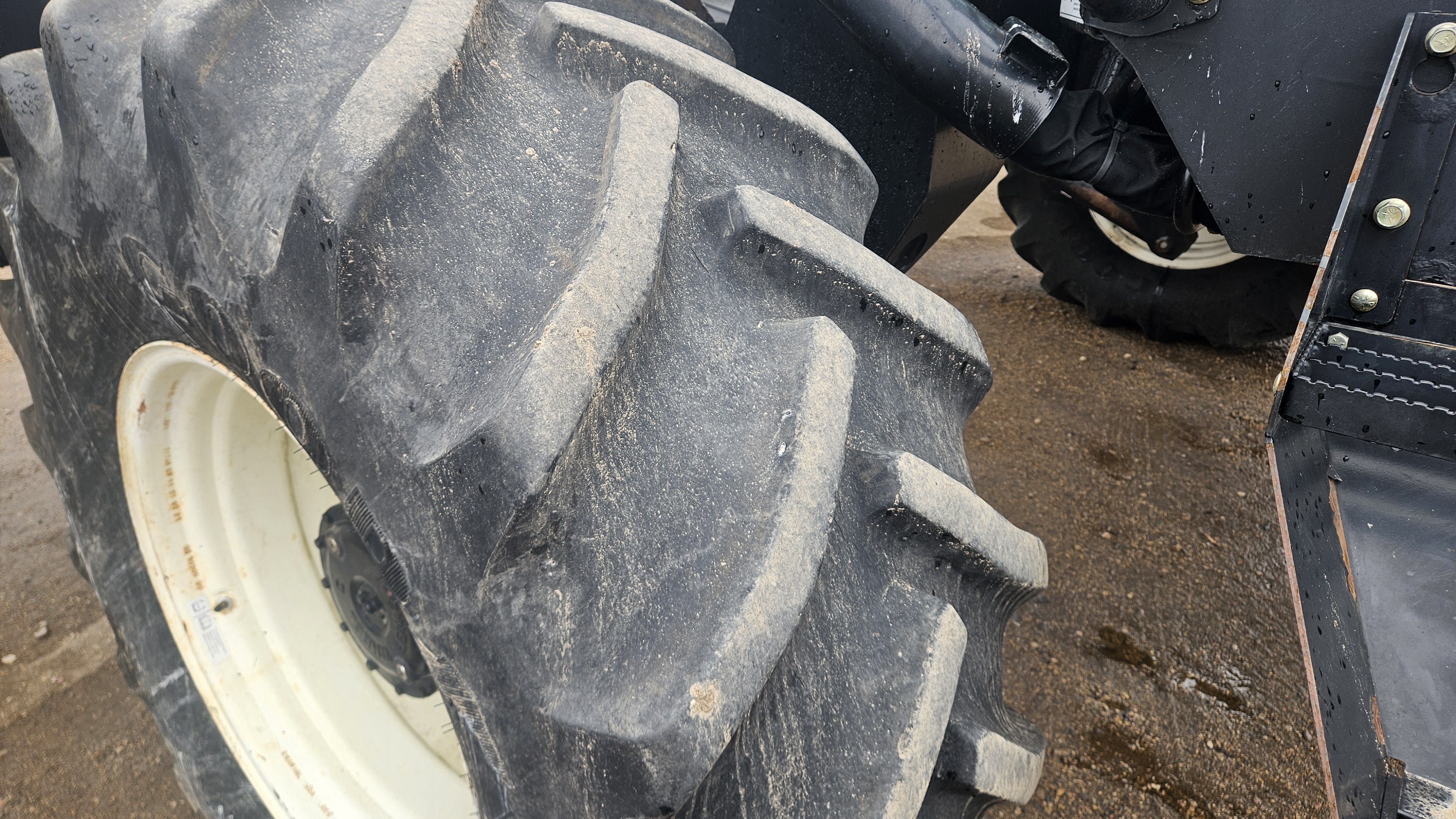 2010 MacDon M150 Windrower
