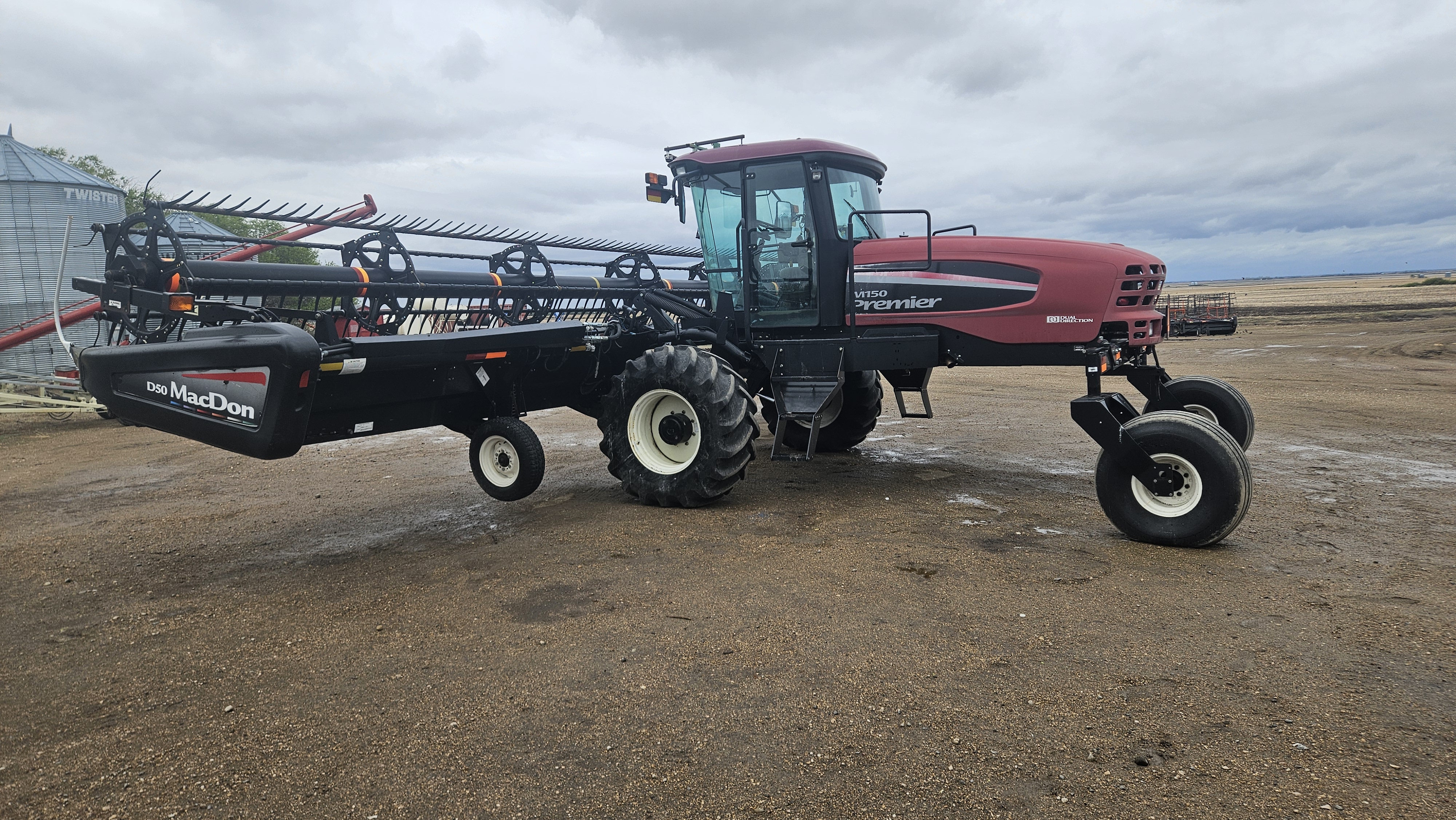 2010 MacDon M150 Windrower