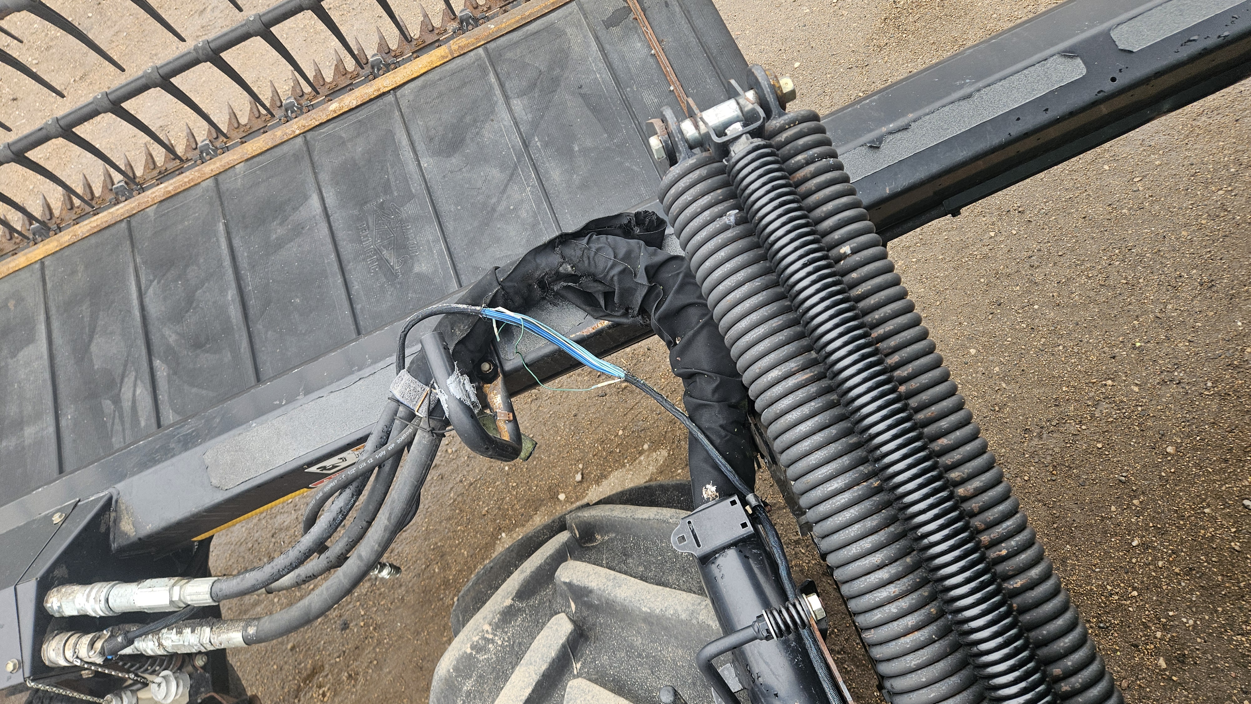 2010 MacDon M150 Windrower