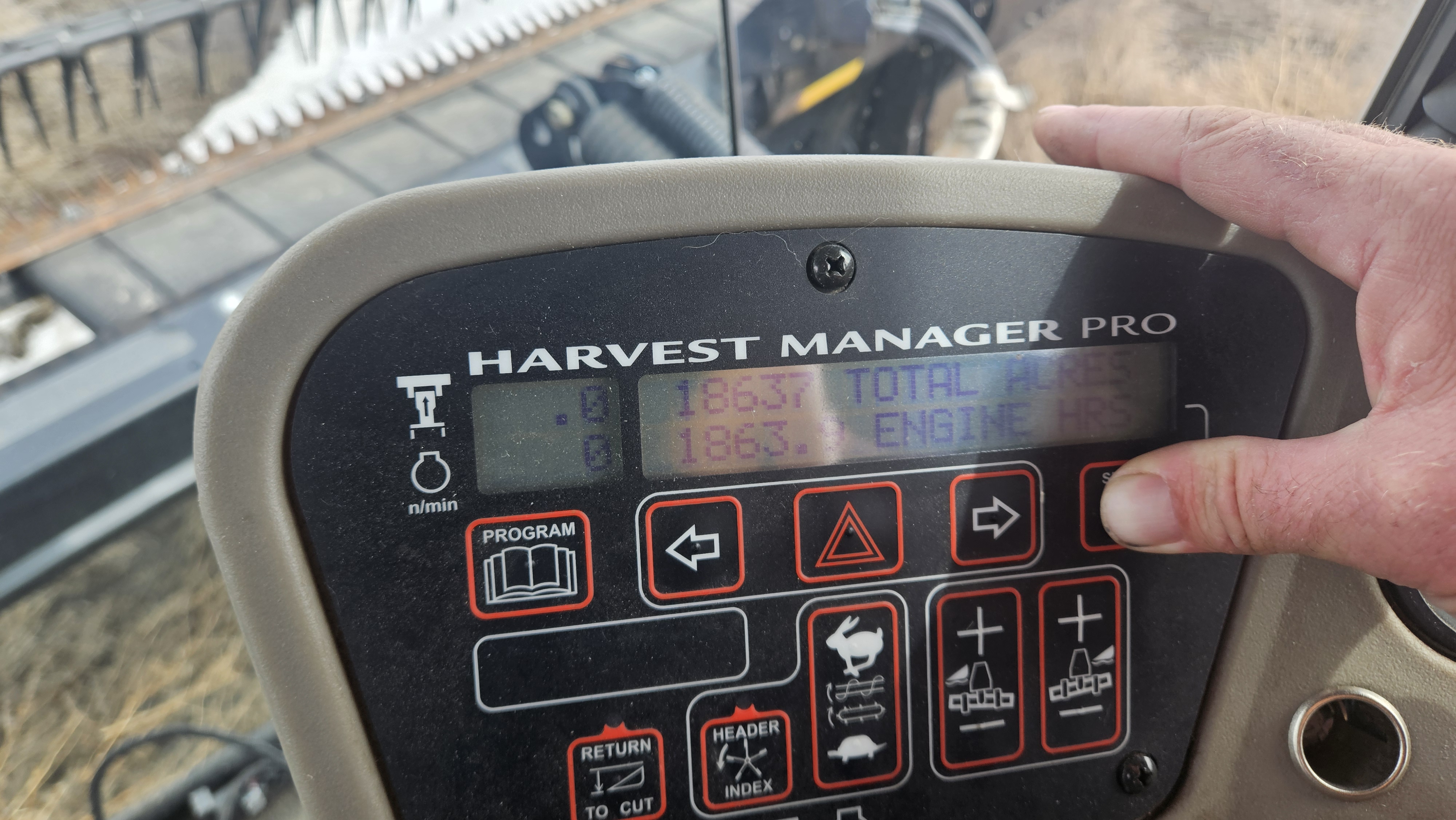 2010 MacDon M150 Windrower