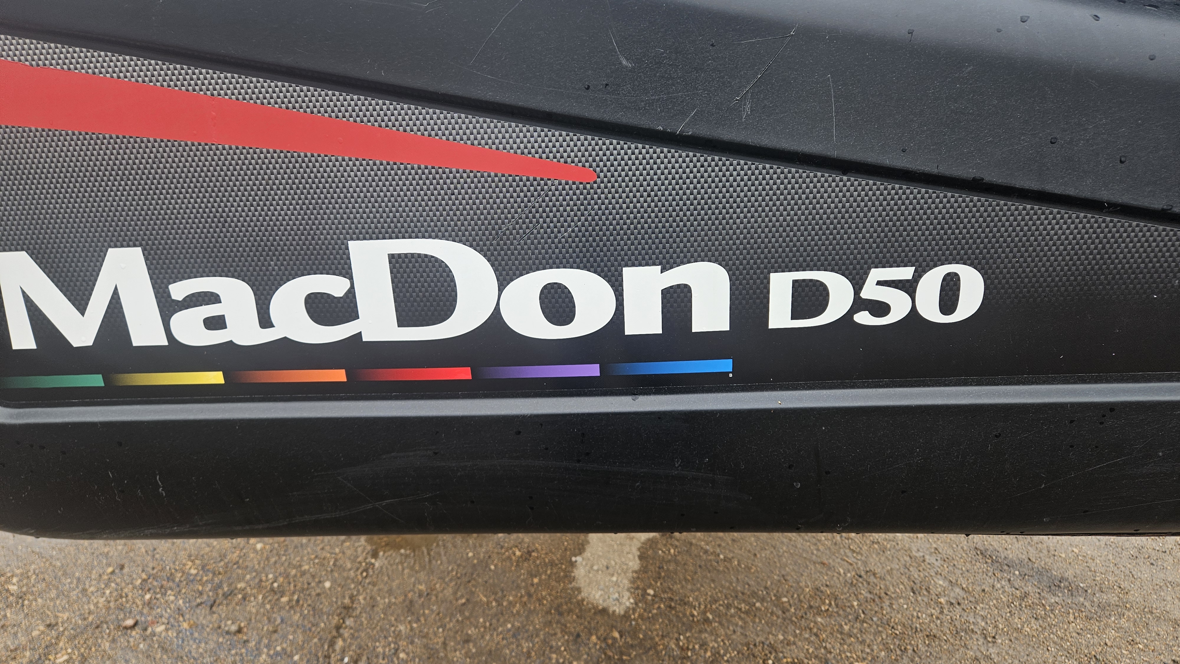 2010 MacDon M150 Windrower