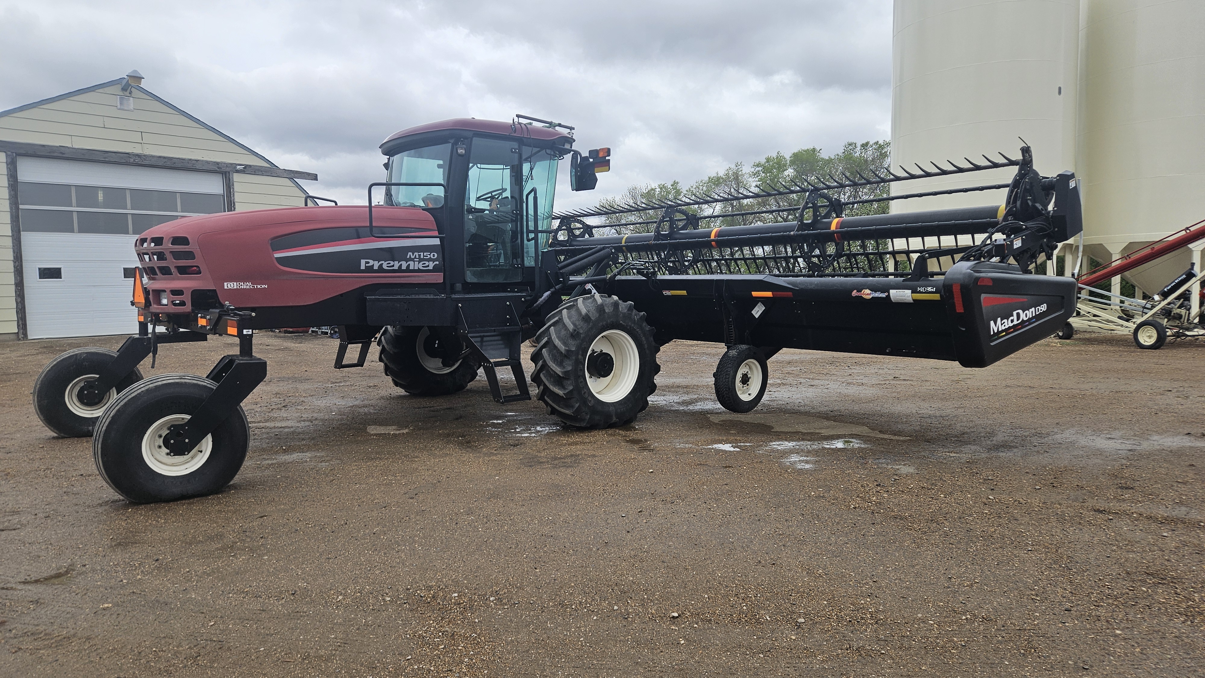 2010 MacDon M150 Windrower