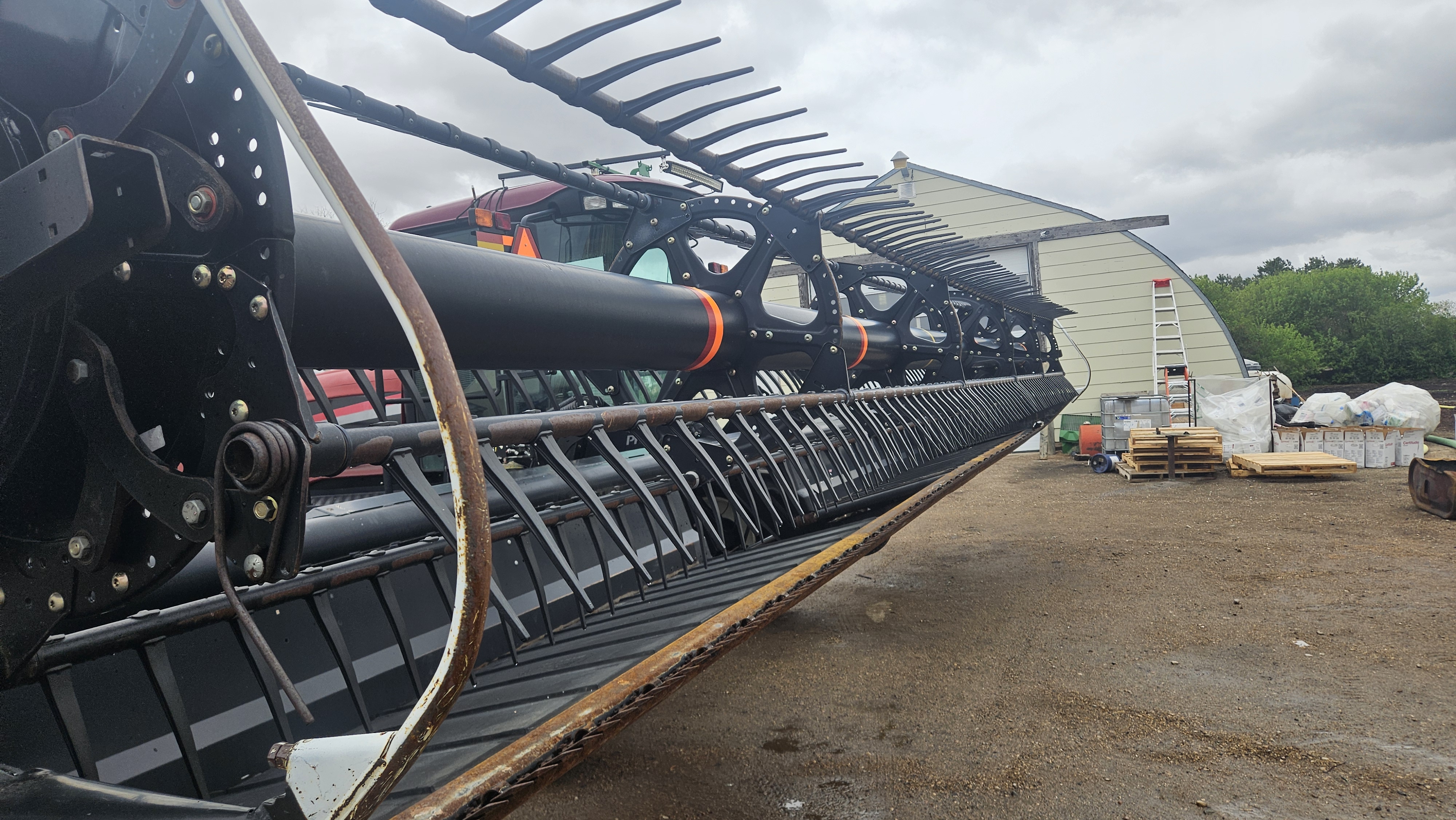 2010 MacDon M150 Windrower