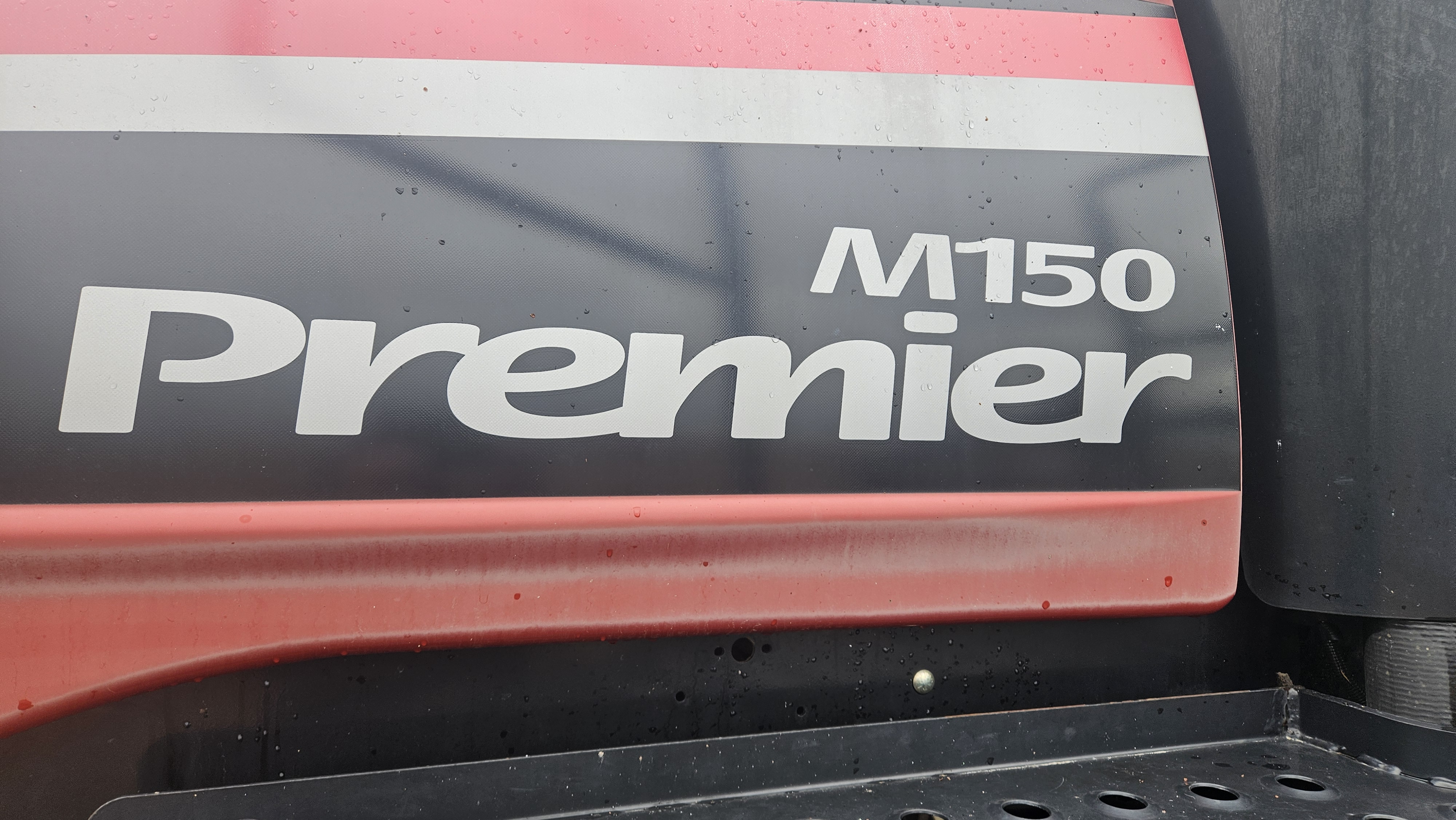2010 MacDon M150 Windrower