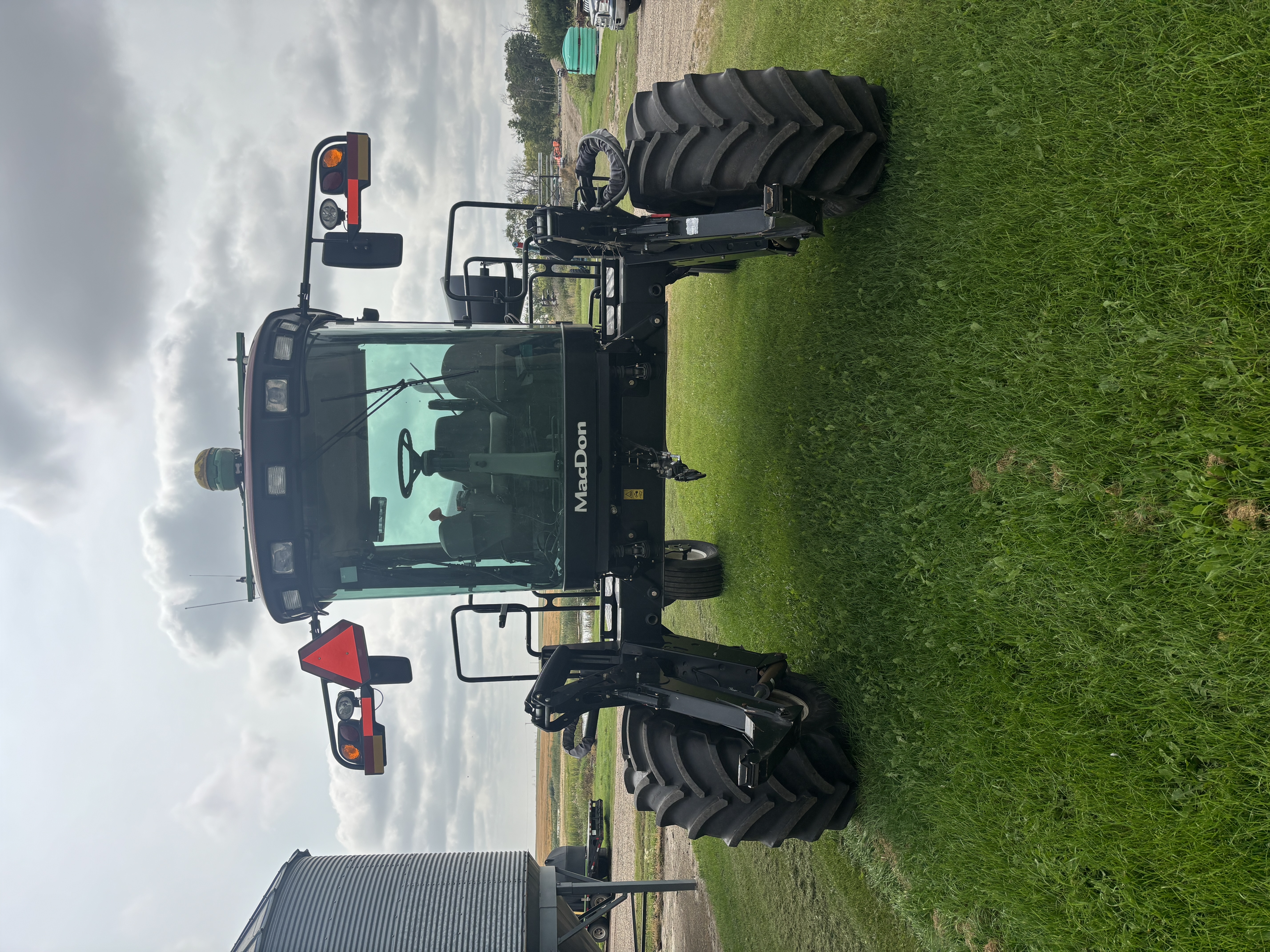 2016 MacDon M155E4 Windrower