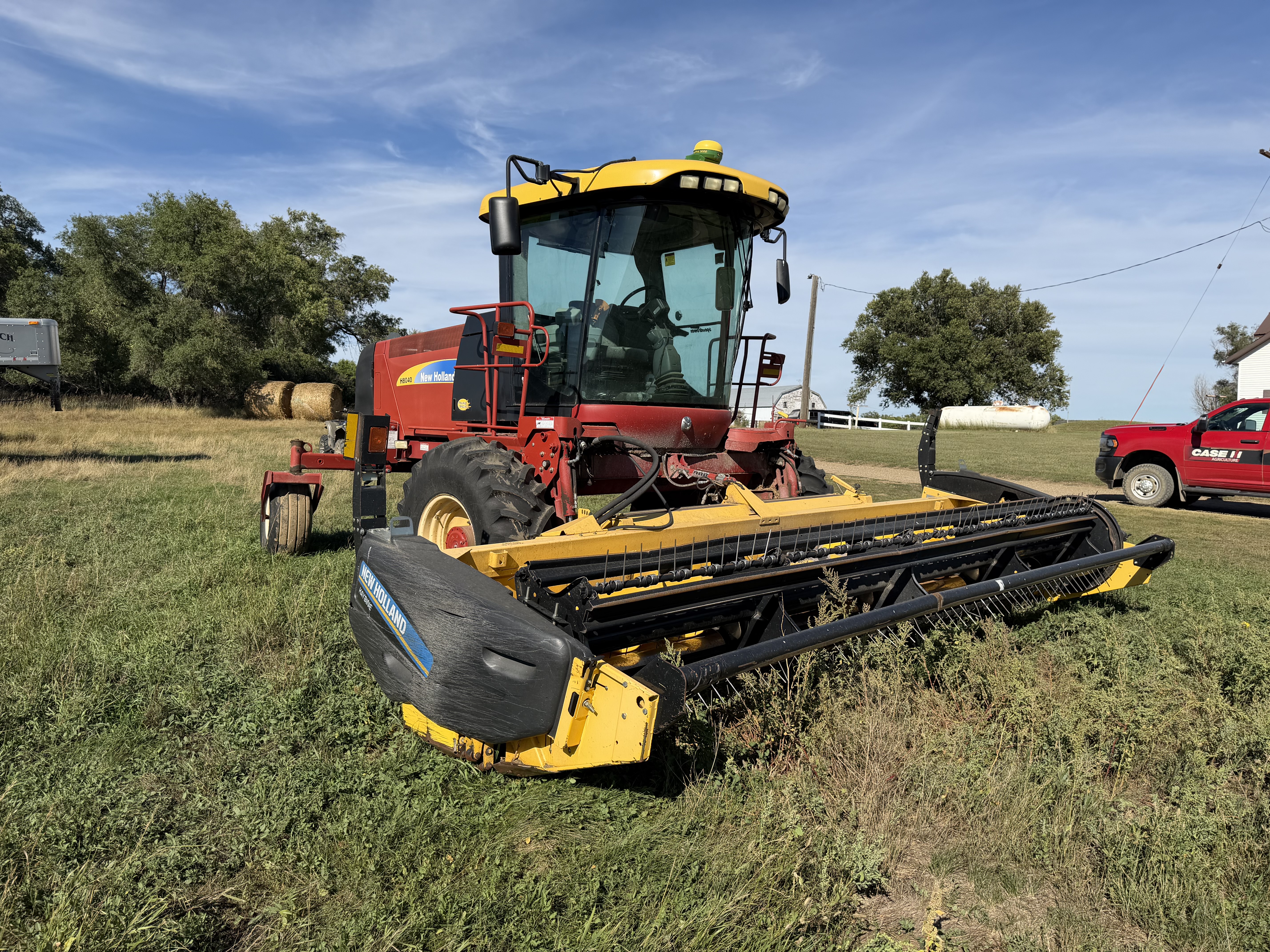 2010 New Holland H8040 Windrower