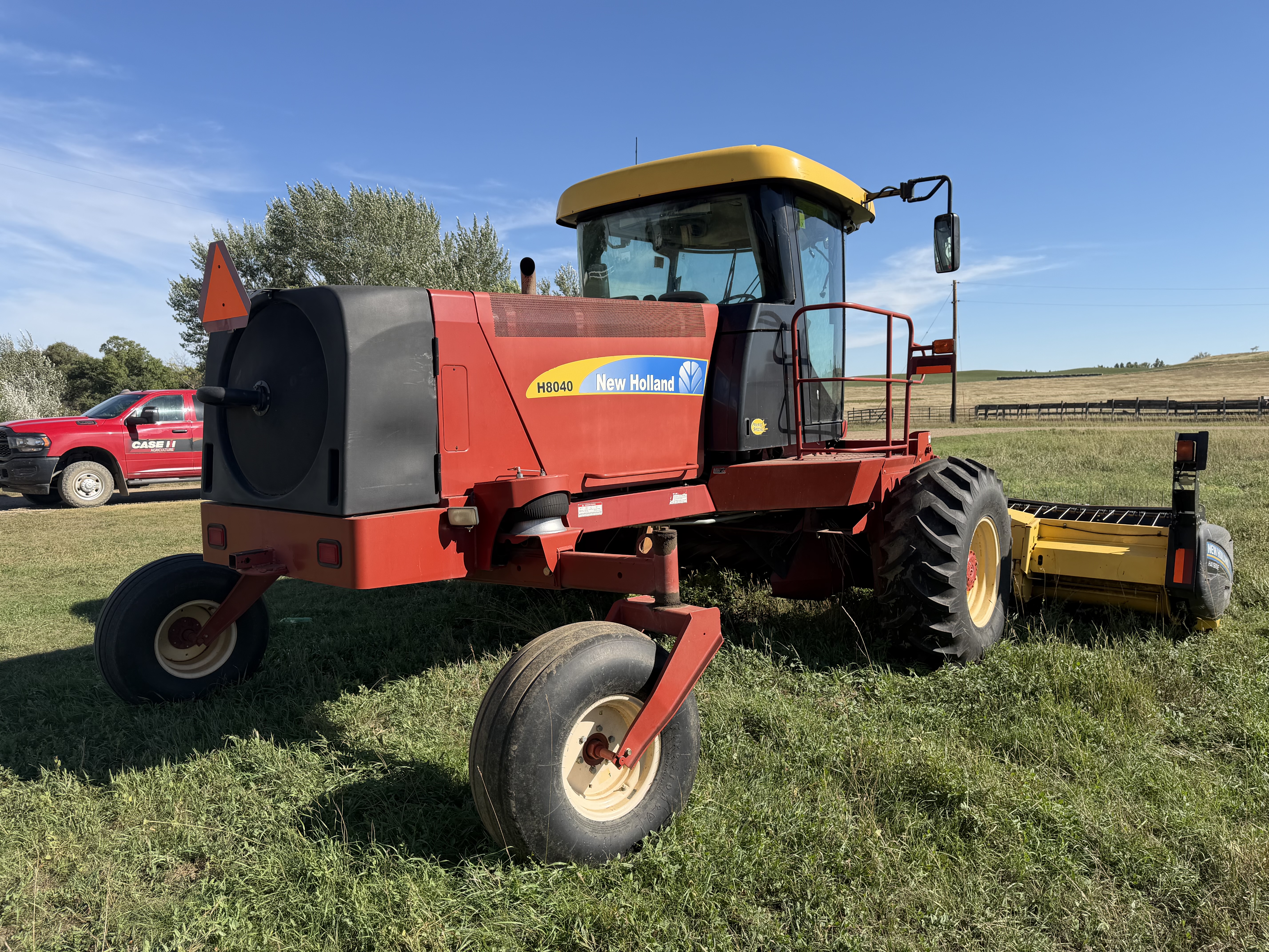 2010 New Holland H8040 Windrower