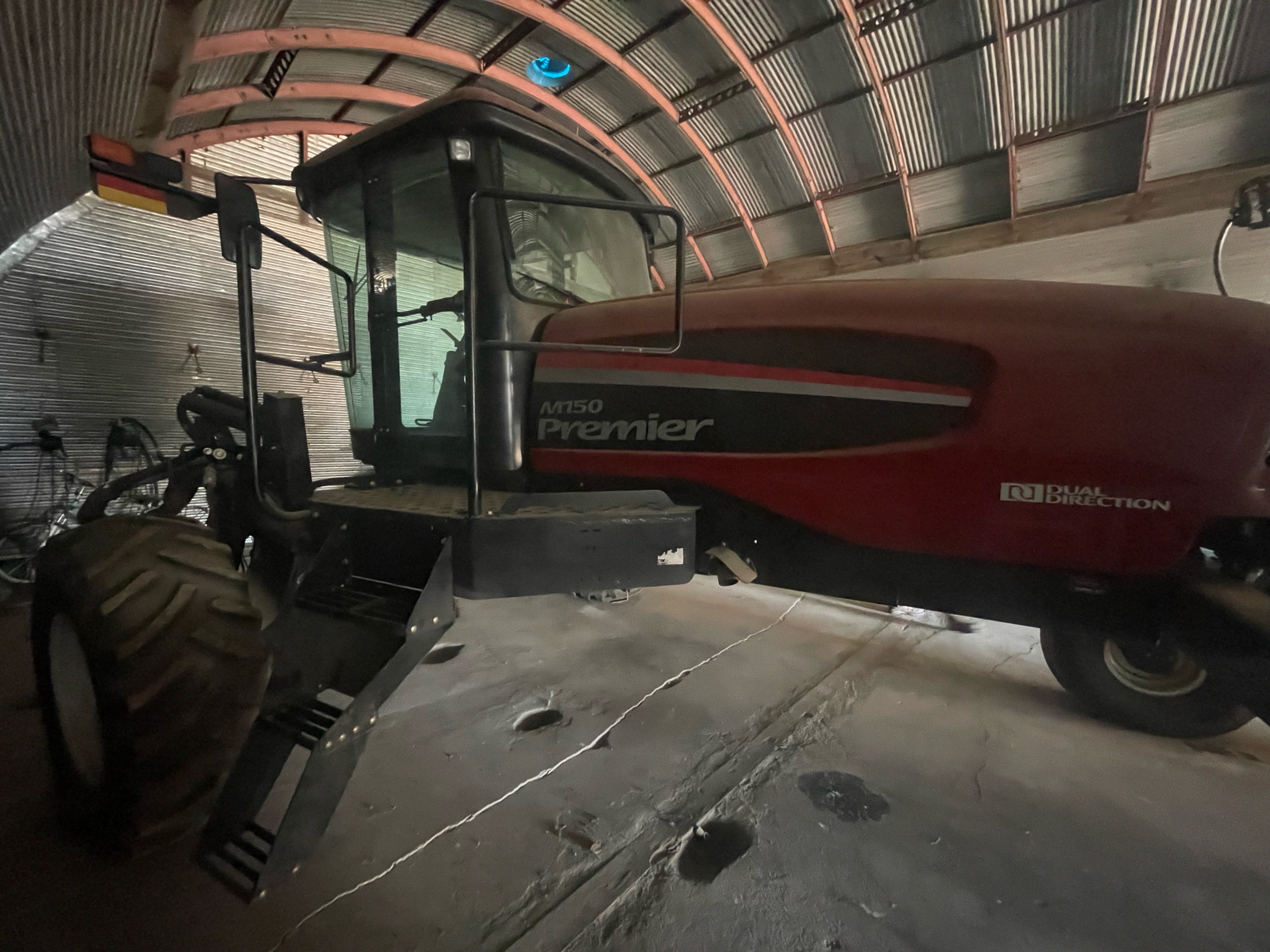 2010 MacDon M150 Windrower