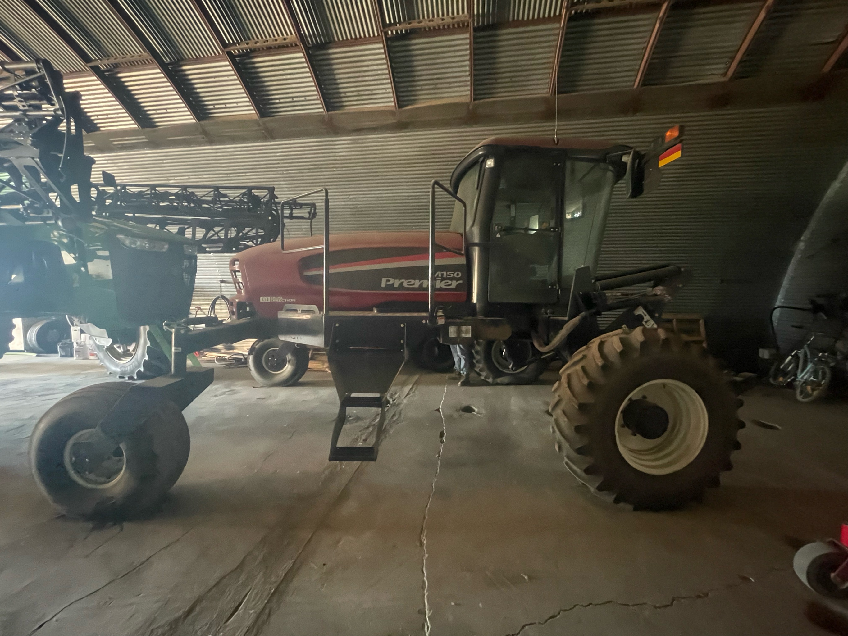 2010 MacDon M150 Windrower