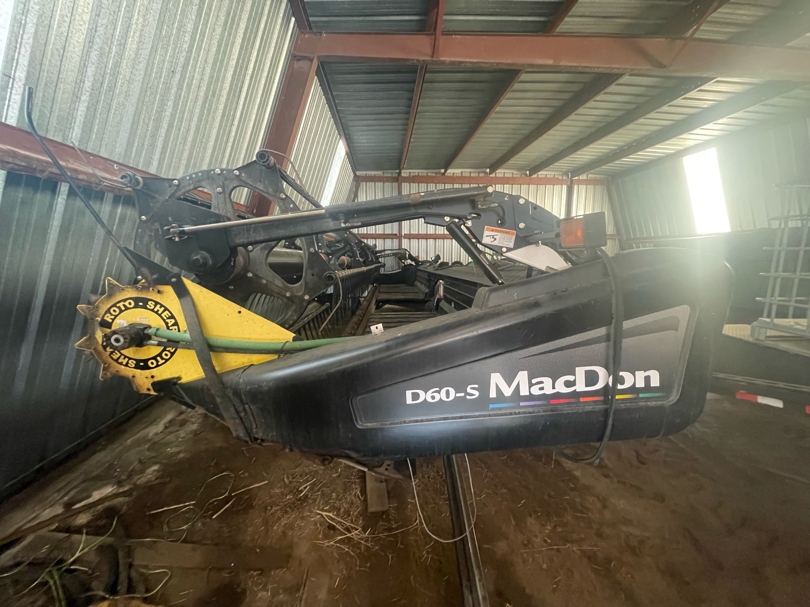 2010 MacDon M150 Windrower