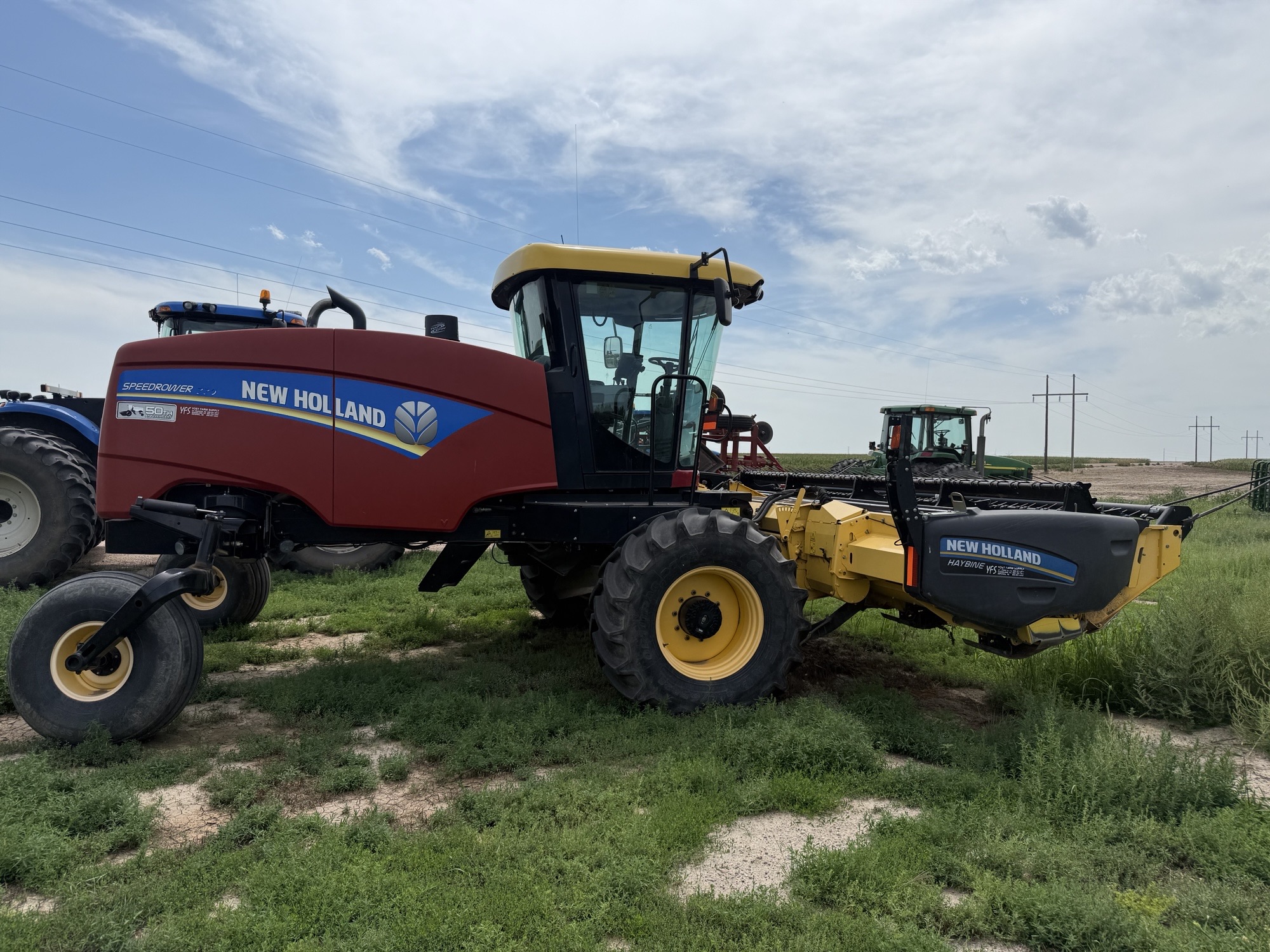 2015 New Holland SPEEDR220 Windrower
