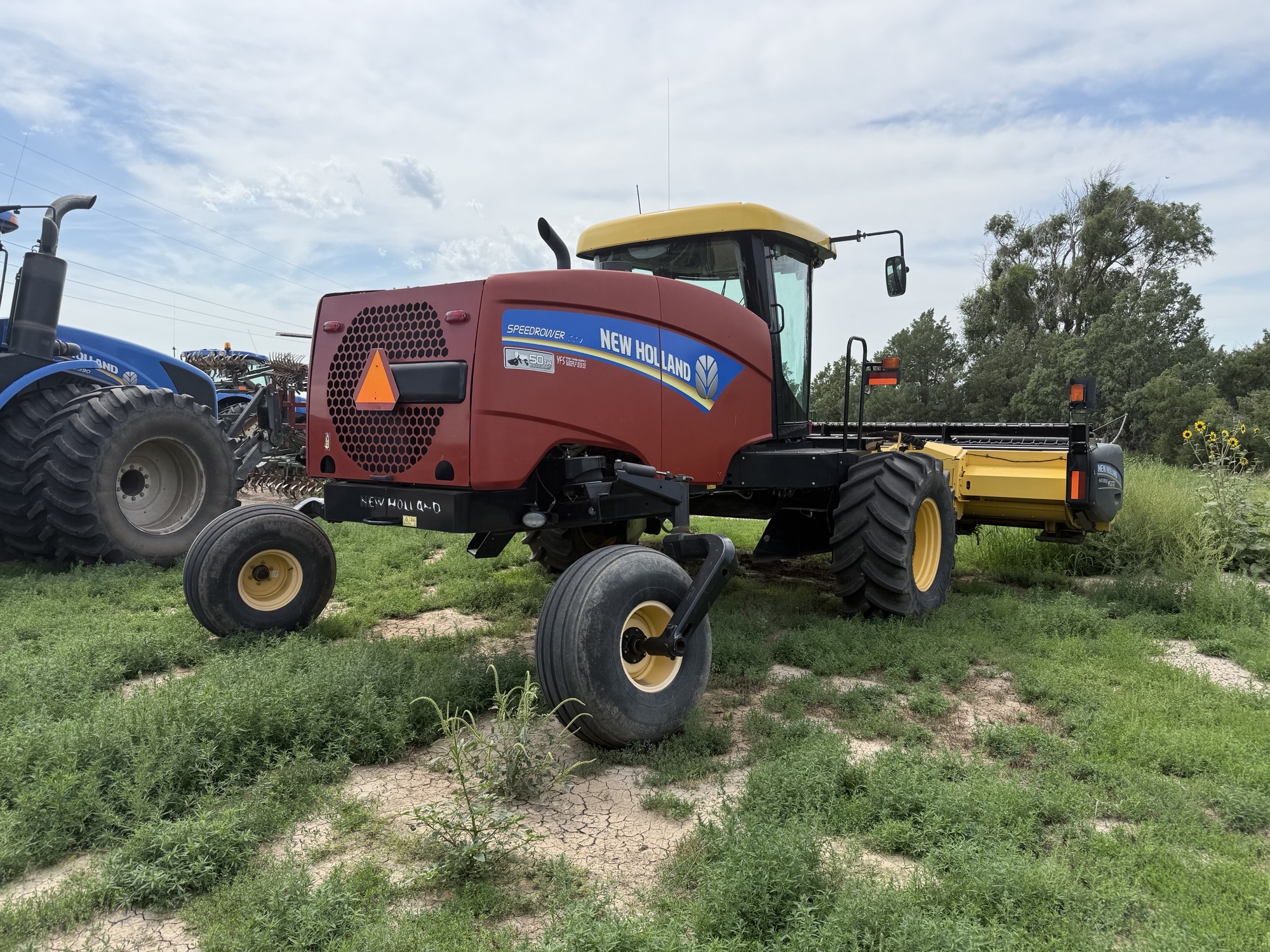2015 New Holland SPEEDR220 Windrower