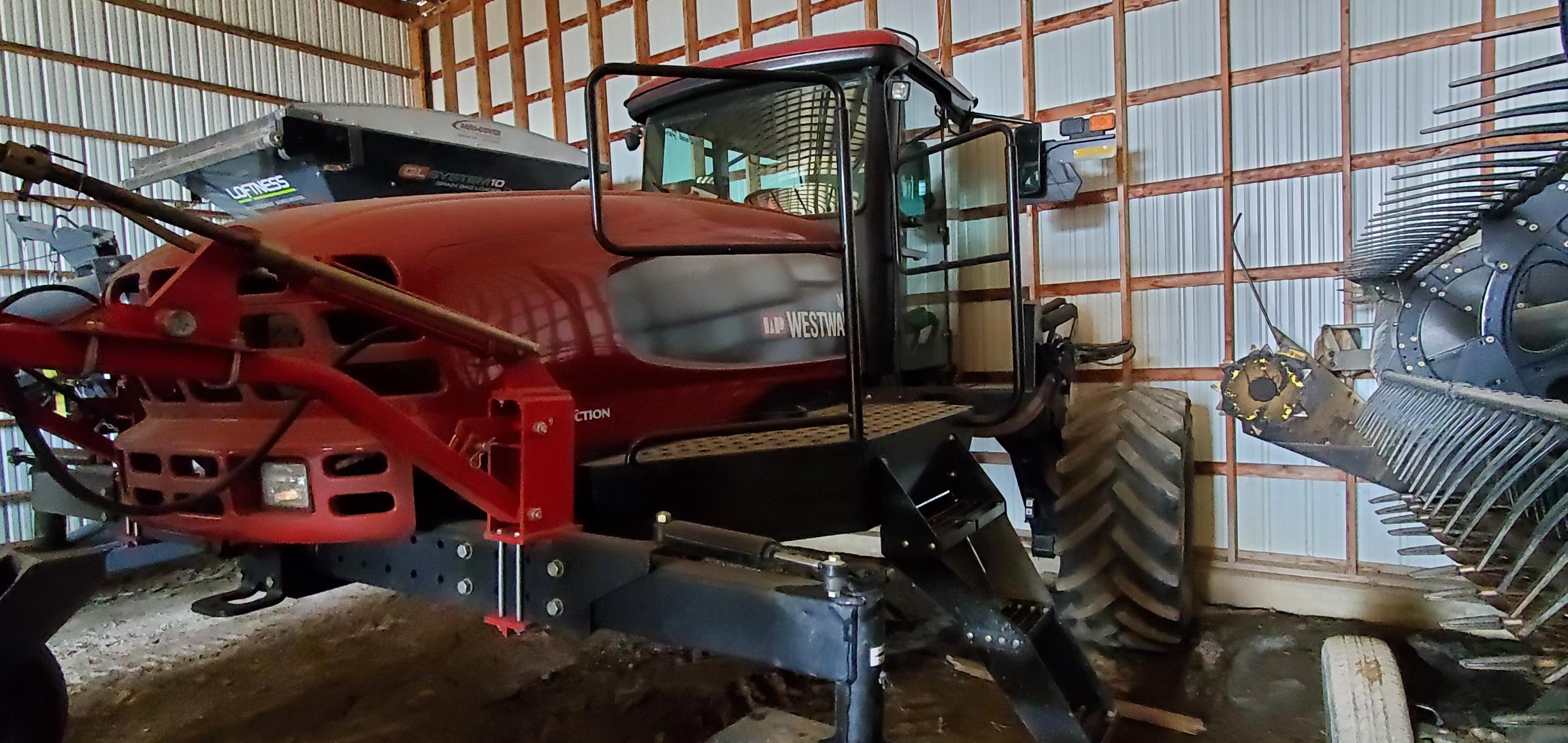 2009 MacDon M150 Windrower