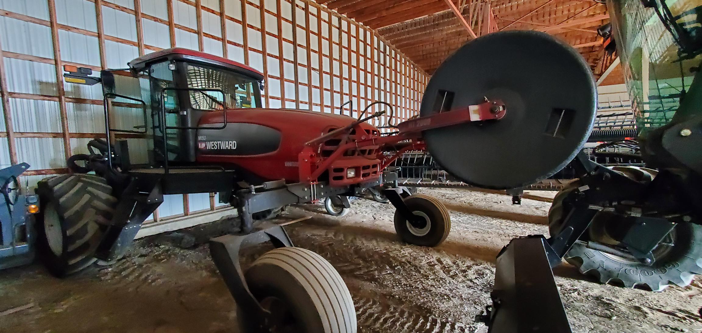 2009 MacDon M150 Windrower