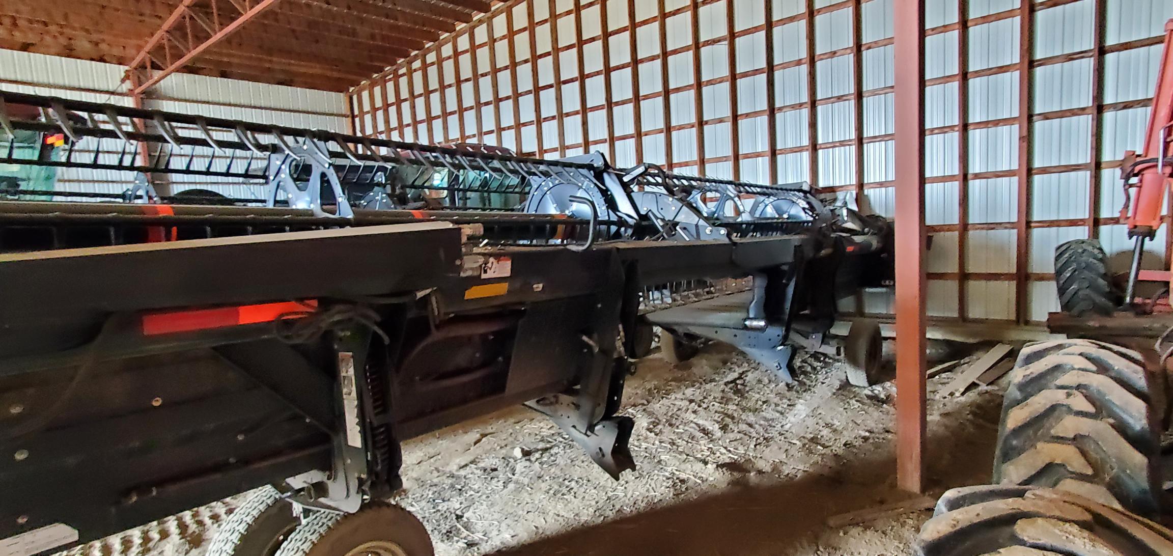 2009 MacDon M150 Windrower