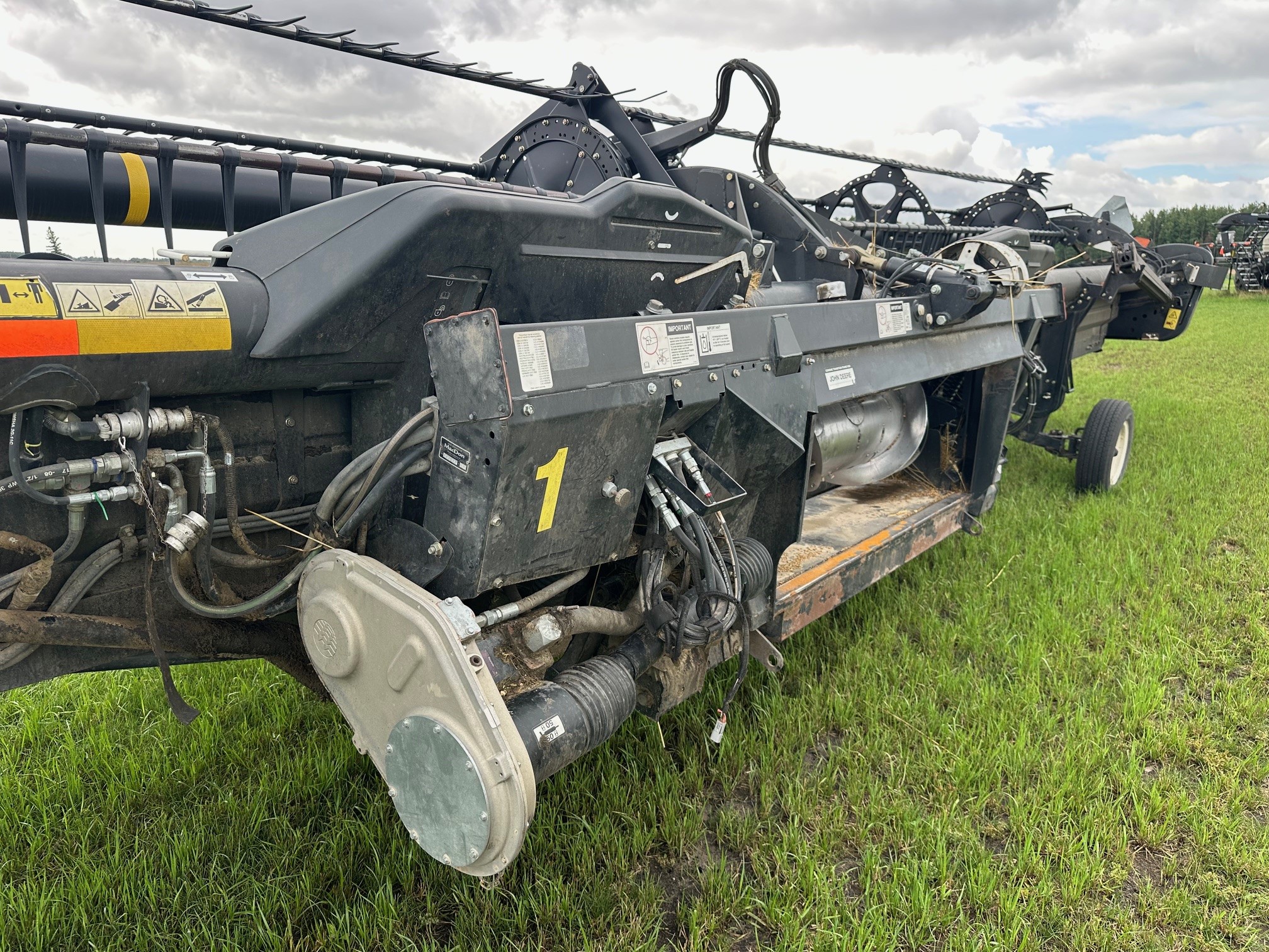 2012 MacDon FD70- JD Header Combine