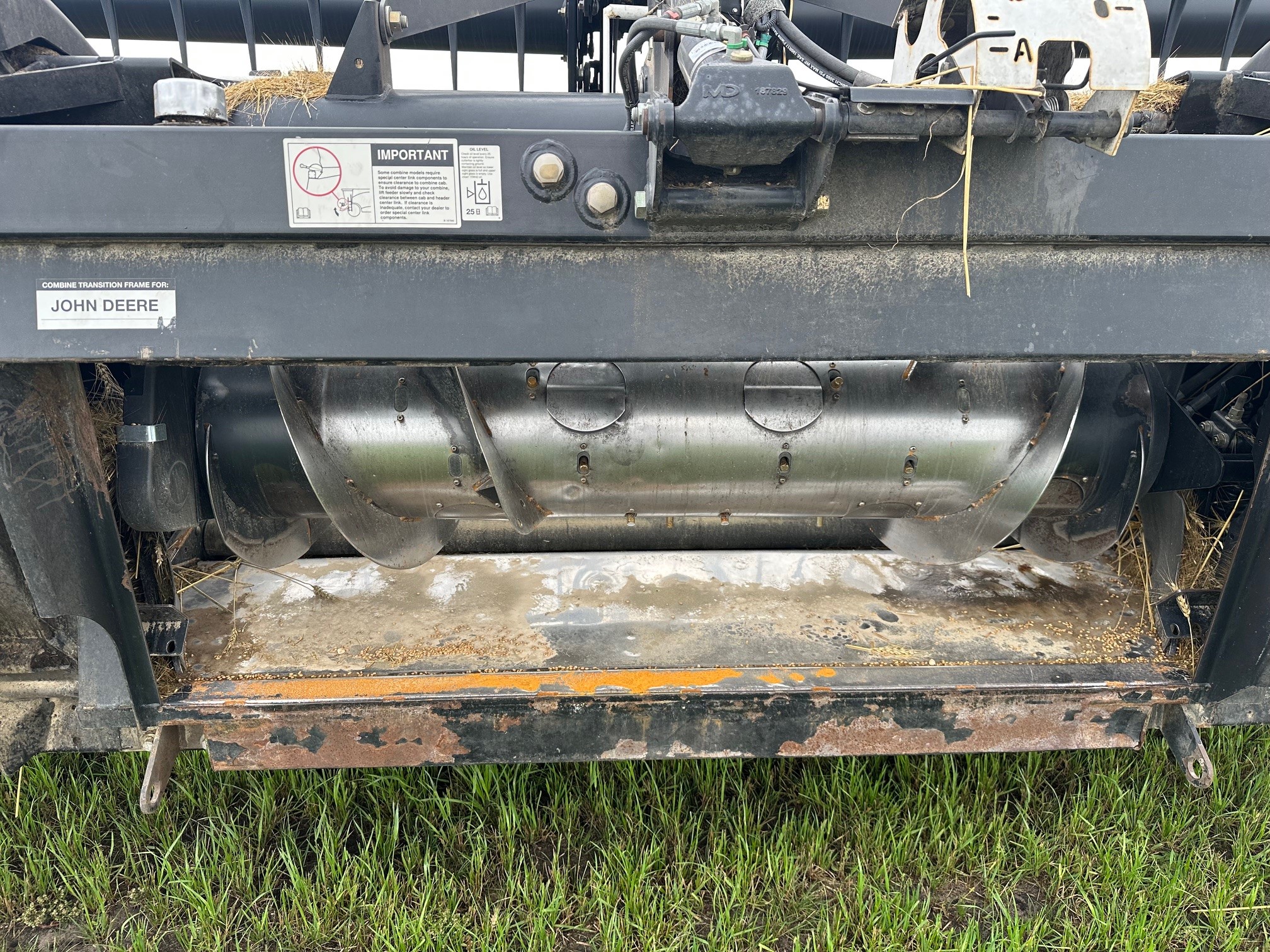 2012 MacDon FD70- JD Header Combine