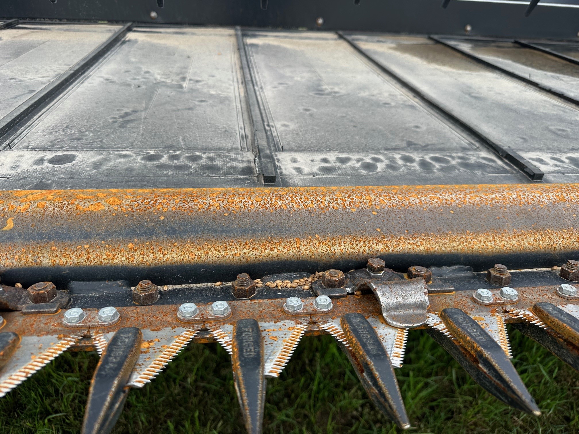 2012 MacDon FD70- JD Header Combine