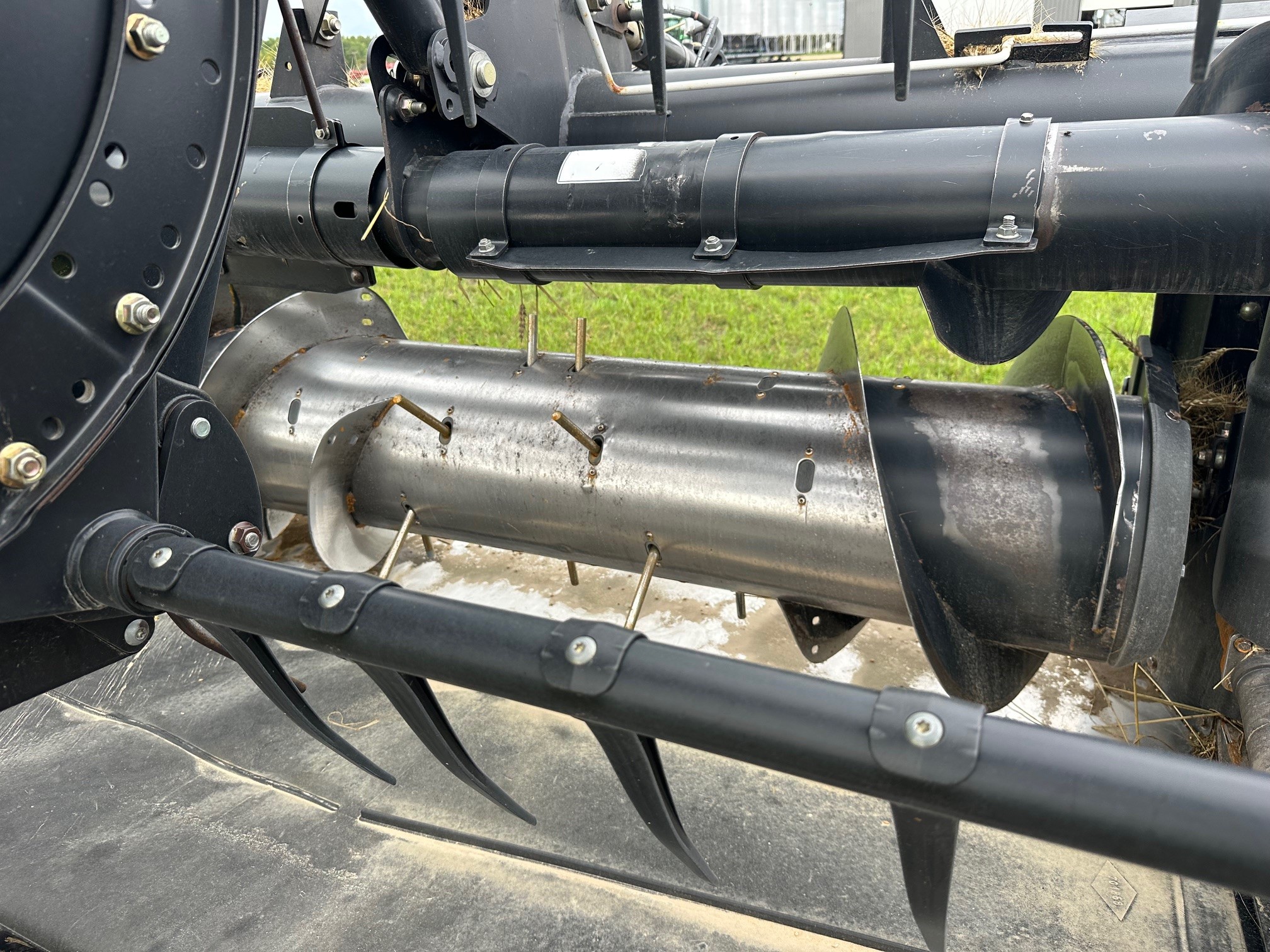 2012 MacDon FD70- JD Header Combine