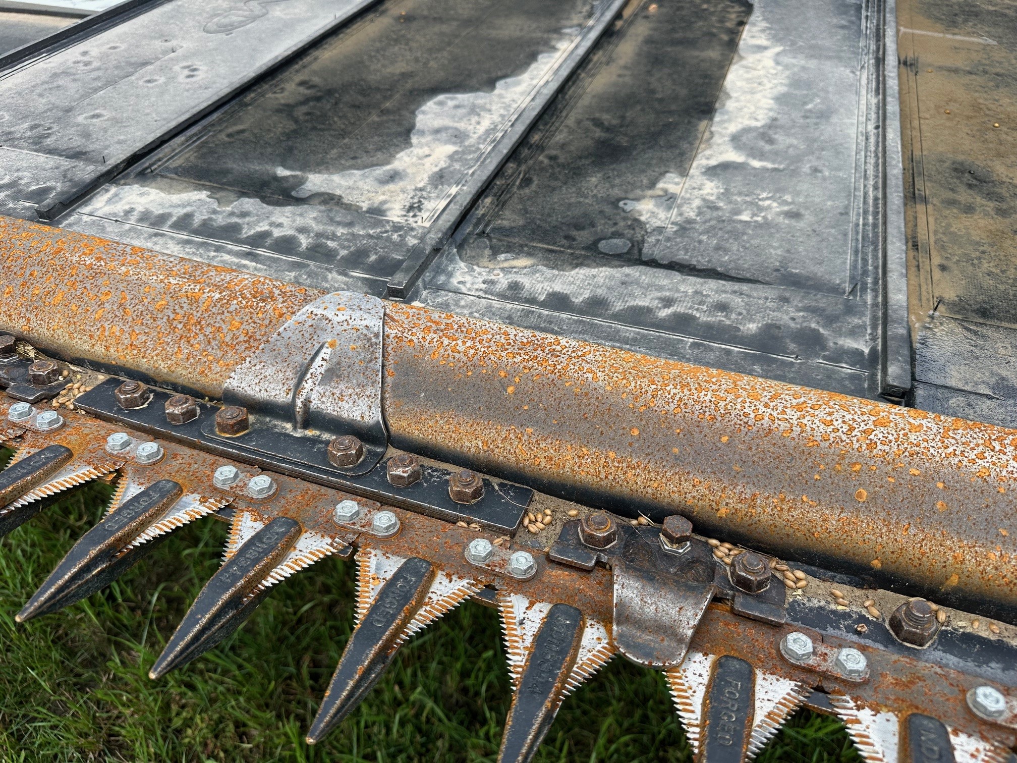 2012 MacDon FD70- JD Header Combine