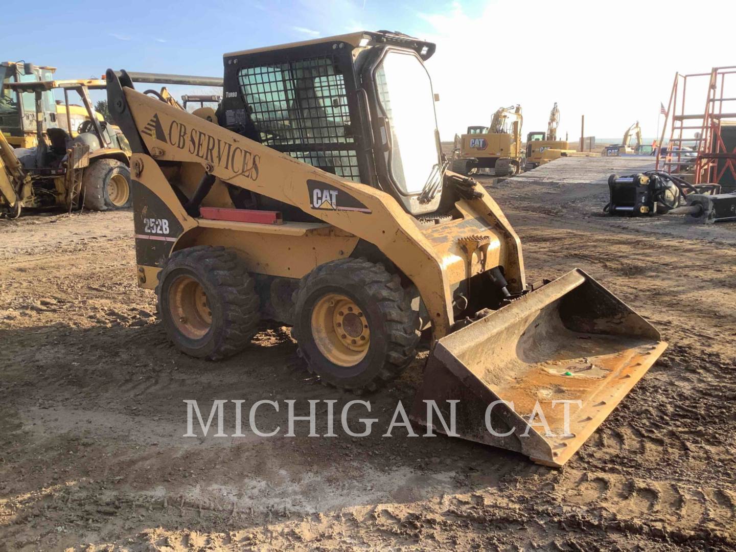 2005 Caterpillar 252B + Skid Steer Loader