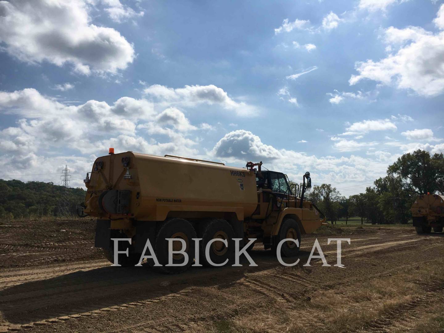 2014 Caterpillar 730C Water Truck